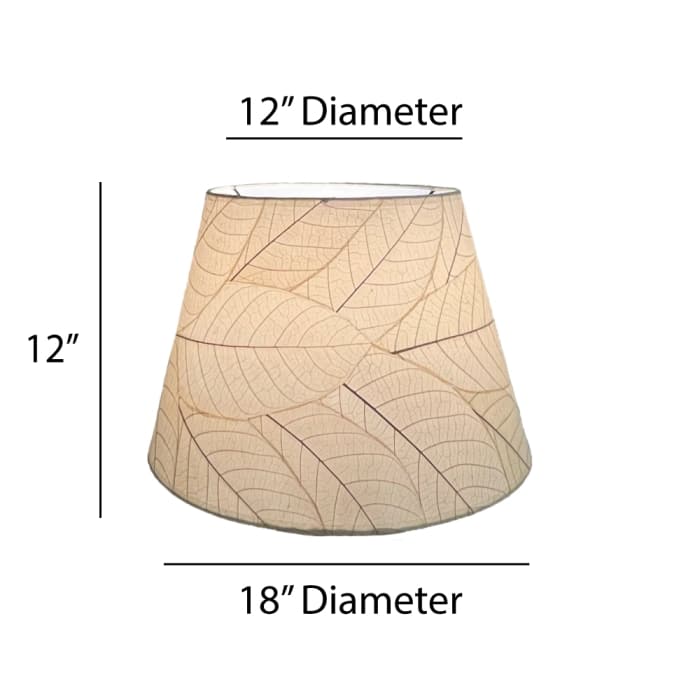 Crafted by the artisans of Eangee Home Design, the 18 Inch British Empire Shade in natural against a clean backdrop, featuring fossilized cocoa leaf shade, wrought iron frame, eco friendly, sustainably sourced.