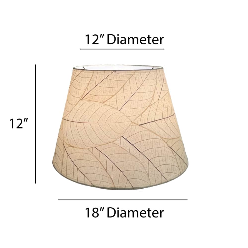 Crafted by the artisans of Eangee Home Design, the 18 Inch British Empire Shade in natural against a clean backdrop, featuring fossilized cocoa leaf shade, wrought iron frame, eco friendly, sustainably sourced.