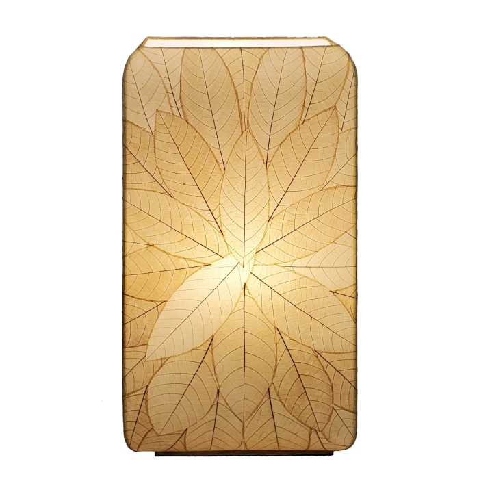 Crafted by the artisans of Eangee Home Design, the Sunburst Giant Floor Lamp in natural against a clean backdrop, featuring fossilized cocoa leaf shade, fair trade, handcrafted.
