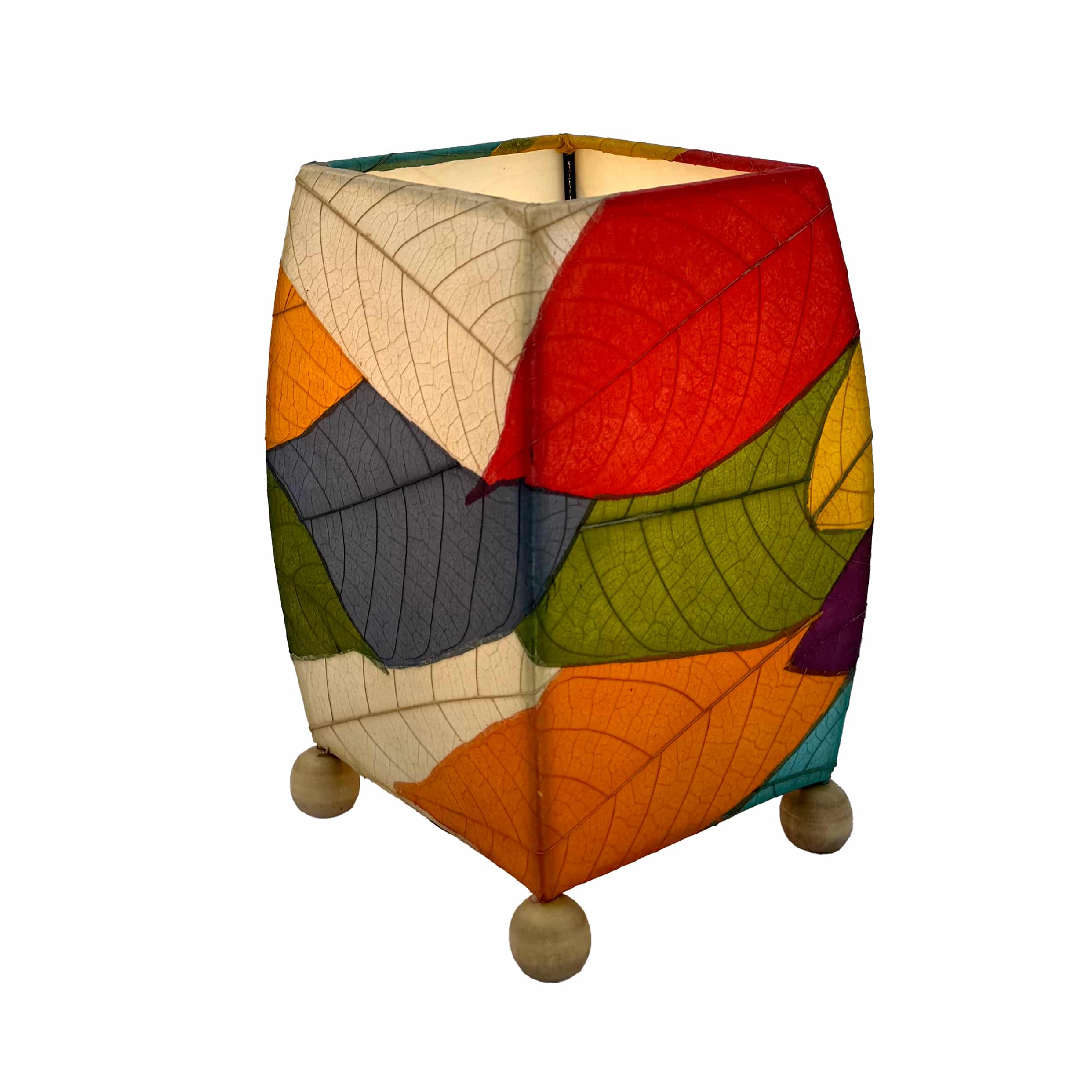 Crafted by the artisans of Eangee Home Design, the Mini Square Cocoa Leaf Table Lamp in multi color against a clean backdrop, featuring fossilized cocoa leaf shade, wrought iron frame, fair trade, eco friendly, sustainably sourced, handcrafted.