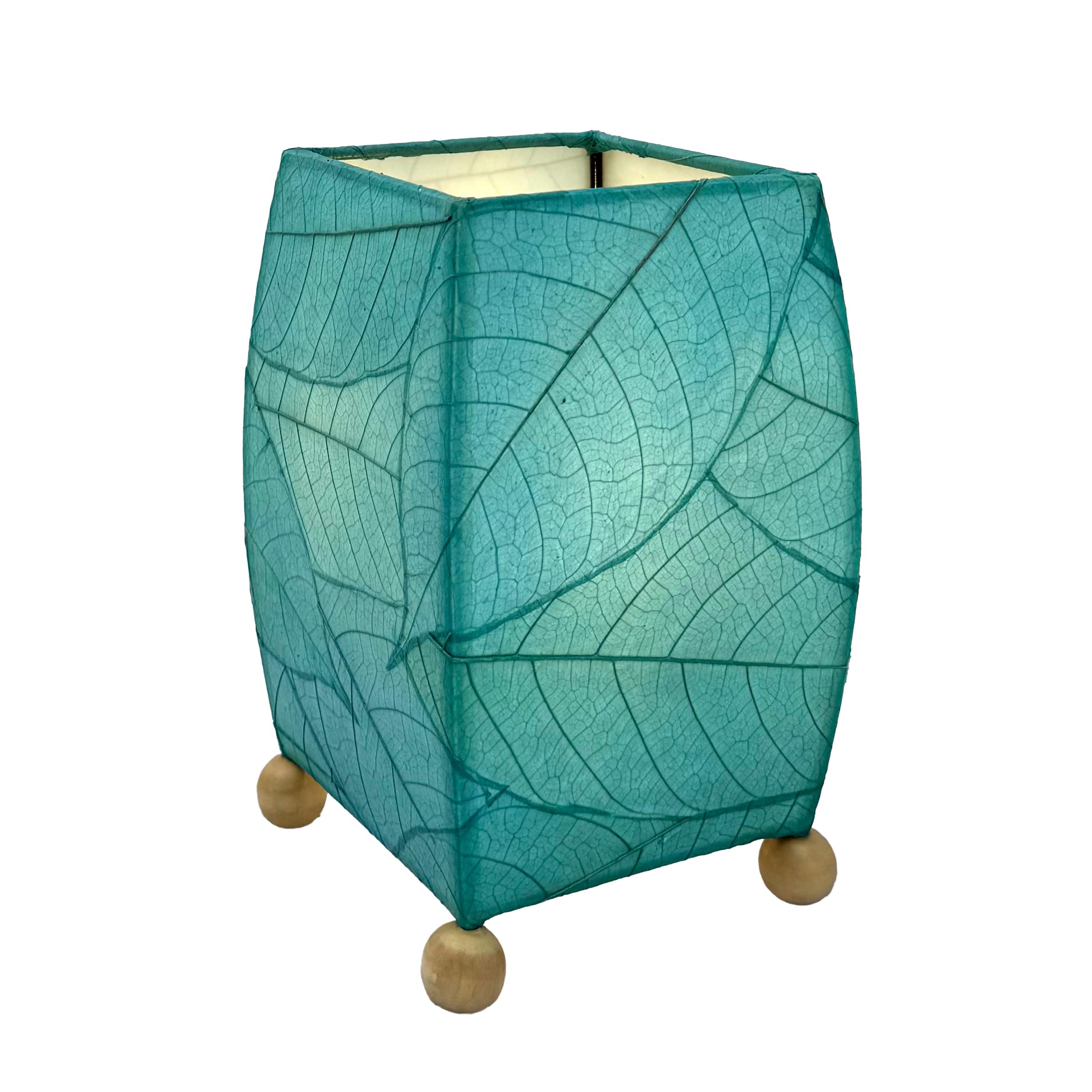 Crafted by the artisans of Eangee Home Design, the Mini Square Cocoa Leaf Table Lamp in sea blue against a clean backdrop, featuring fossilized cocoa leaf shade, wrought iron frame, fair trade, eco friendly, sustainably sourced, handcrafted.