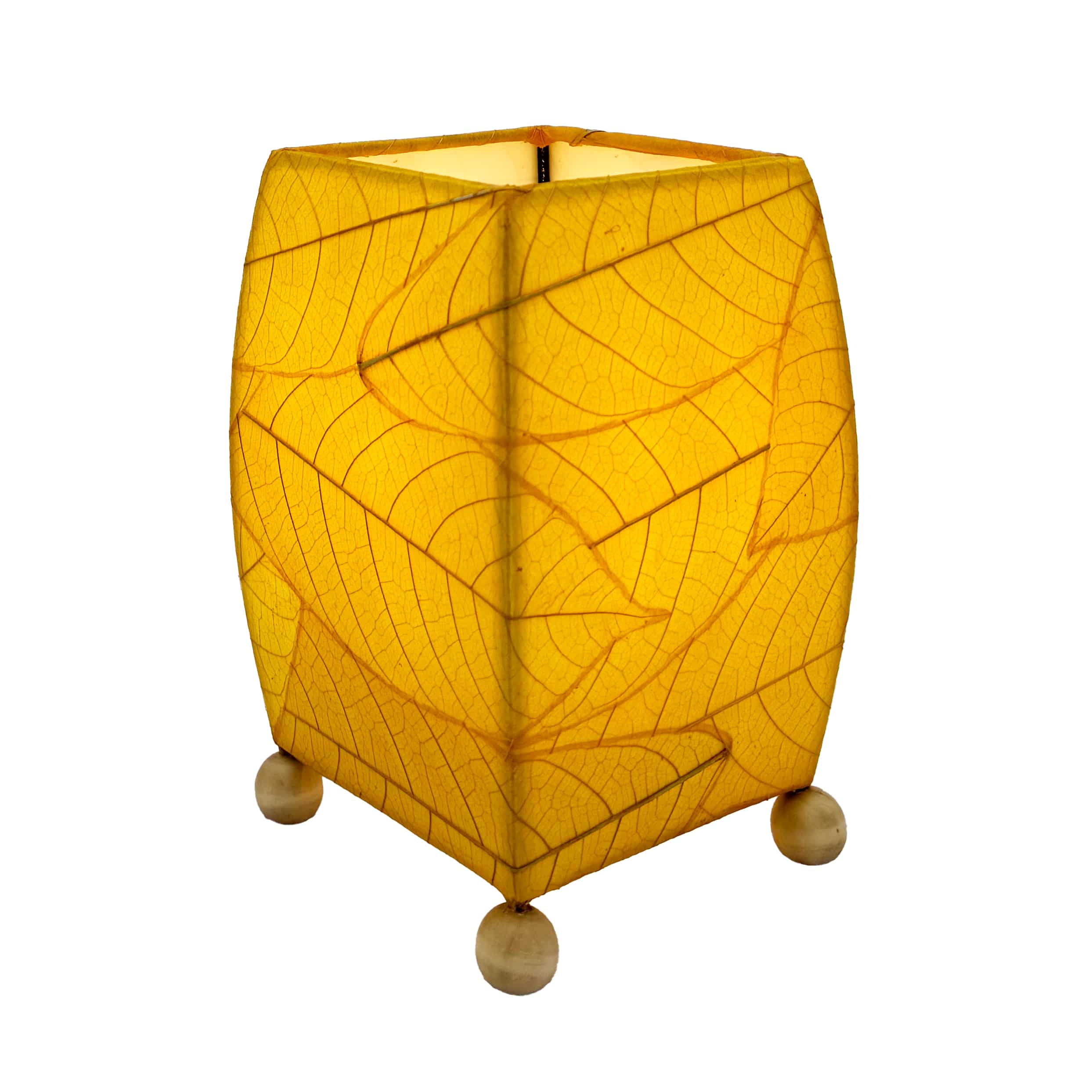 Crafted by the artisans of Eangee Home Design, the Mini Square Cocoa Leaf Table Lamp in yellow against a clean backdrop, featuring fossilized cocoa leaf shade, wrought iron frame, fair trade, eco friendly, sustainably sourced, handcrafted.
