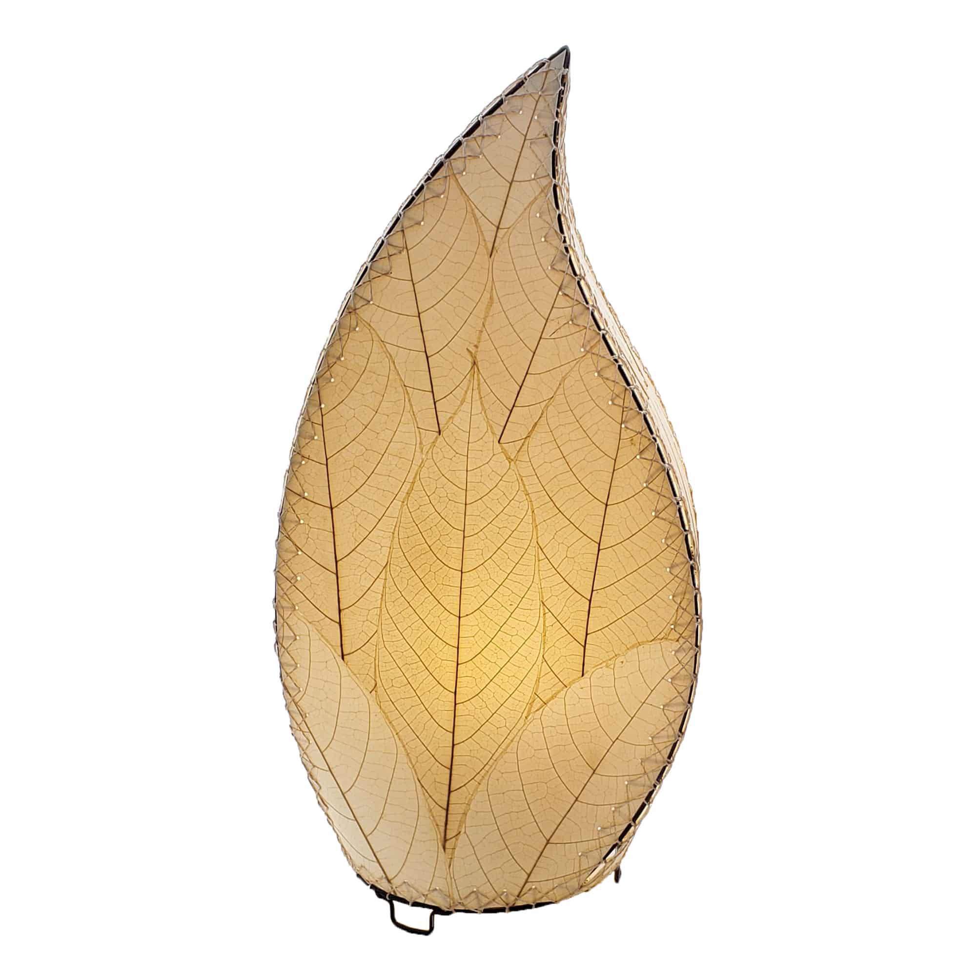 In a softly lit reading nook, crafted by the artisans of Eangee Home Design, the 24 Inch Leaflet Lamp in natural stands gracefully, featuring fossilized cocoa leaf shade, abaca rope accents, wrought iron frame, handcrafted, adding warmth and character to the space.