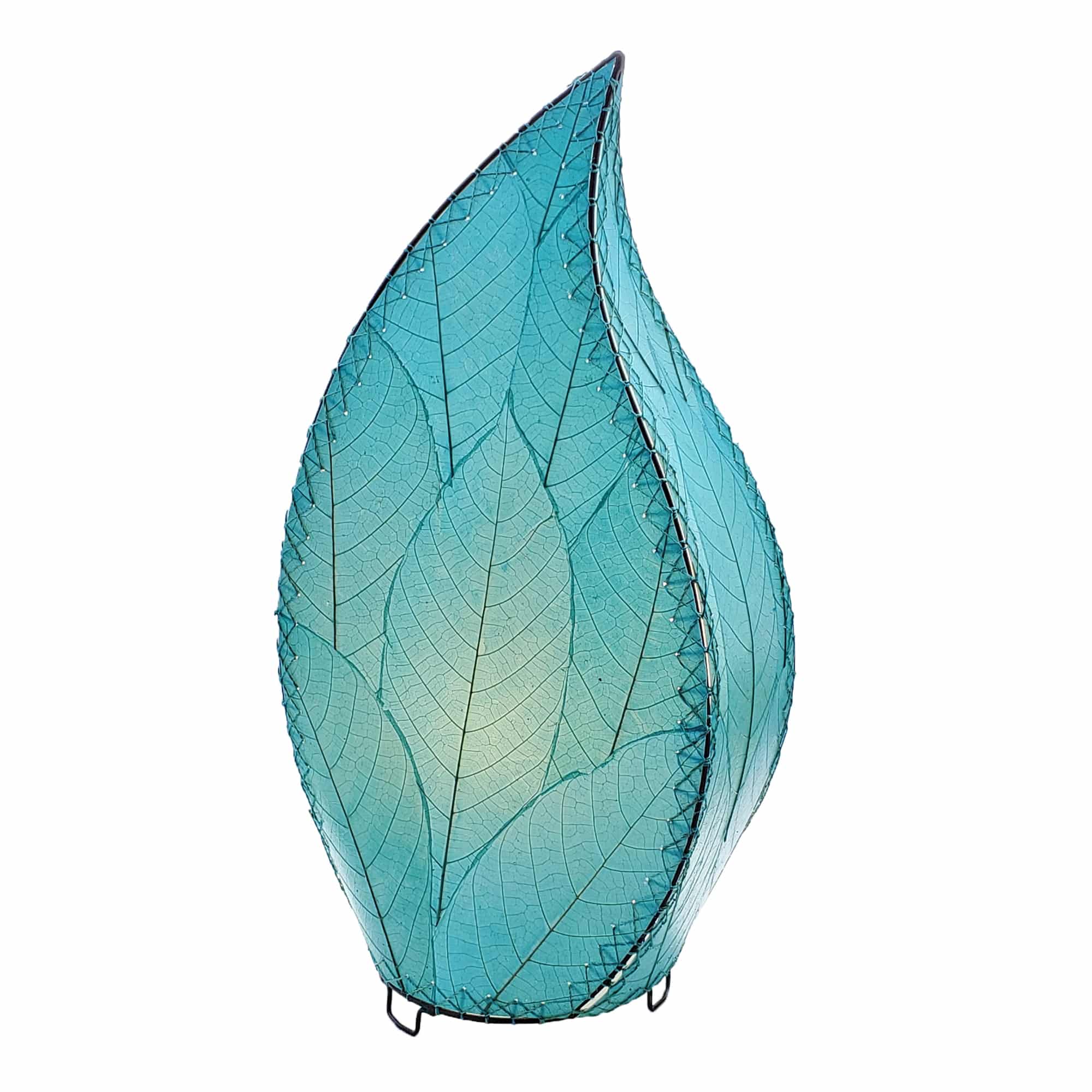 In a modern interior with earth tones, crafted by the artisans of Eangee Home Design, the 24 Inch Leaflet Lamp in sea blue stands gracefully, featuring fossilized cocoa leaf shade, abaca rope accents, wrought iron frame, handcrafted, adding warmth and character to the space.
