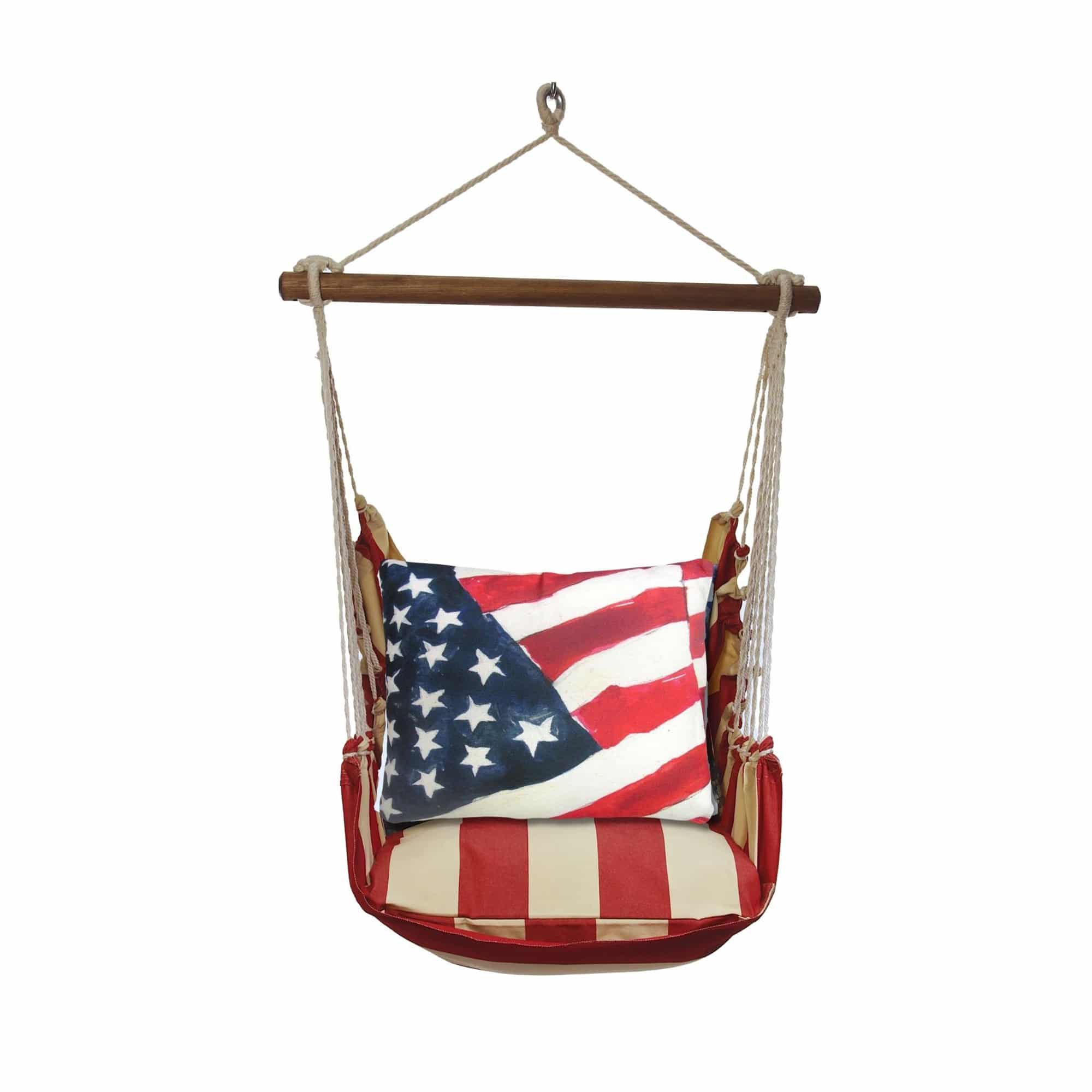 Multi colored outdoor swing crafted by the artisans of Magnolia Casual called the Swing Set 4 piece Americana Stripe w/ Flag featuring 100 percent weather resistant fabric, weather resistant polyester fabric, handcrafted shown against a clean backdrop featuring with a stripe motif.