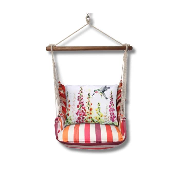 Multi colored outdoor swing crafted by the artisans of Magnolia Casual called the Swing Set 4 piece Cristina Stripe w/ Foxgloves w/Hummingbird featuring 100 percent weather resistant fabric, weather resistant polyester fabric, handcrafted shown against a clean backdrop featuring with a stripe motif.