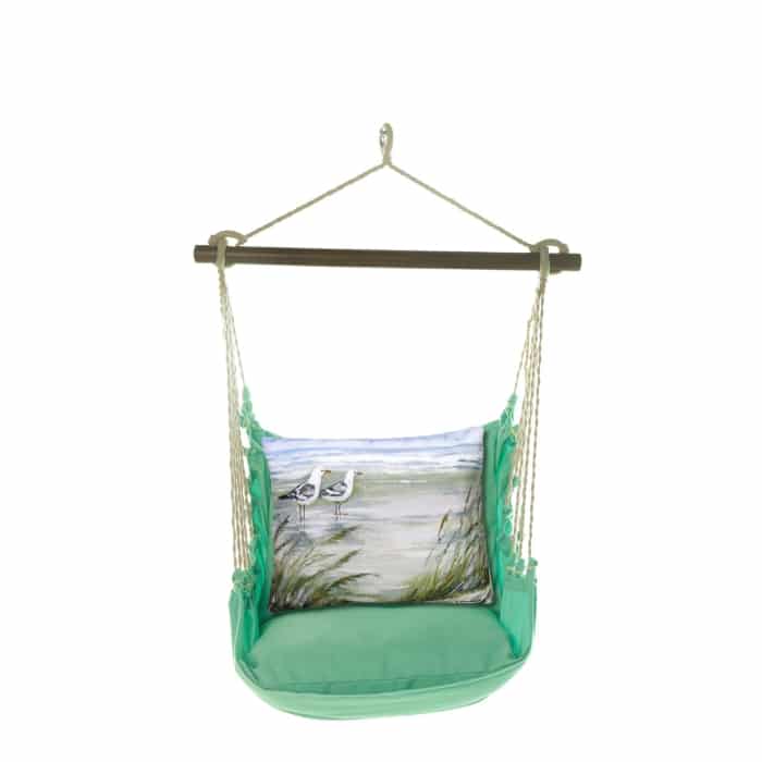 Green outdoor swing crafted by the artisans of Magnolia Casual called the Swing Set 4 piece Seafoam Green Solid w/ Seagulls featuring 100 percent weather resistant fabric, weather resistant polyester fabric, handcrafted shown against a clean backdrop featuring shades of green.