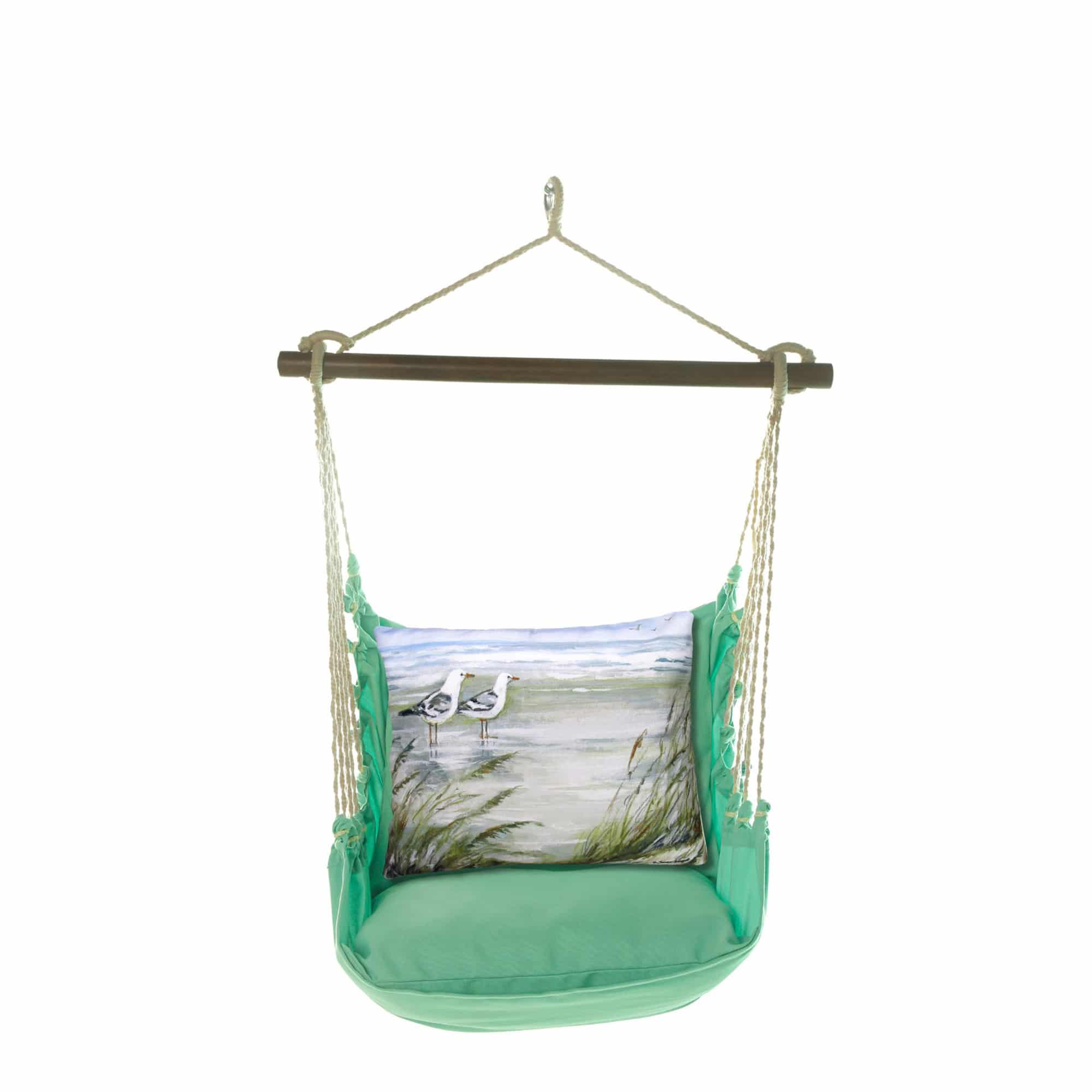 Green outdoor swing crafted by the artisans of Magnolia Casual called the Swing Set 4 piece Seafoam Green Solid w/ Seagulls featuring 100 percent weather resistant fabric, weather resistant polyester fabric, handcrafted shown against a clean backdrop featuring shades of green.