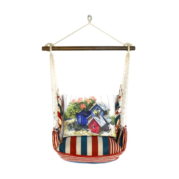 Multi colored outdoor swing crafted by the artisans of Magnolia Casual called the Swing Set 4 piece Stars & Stripes w/ Birdhouses & Flowers featuring 100 percent weather resistant fabric, weather resistant polyester fabric, handcrafted shown against a clean backdrop featuring with a stripes motif.