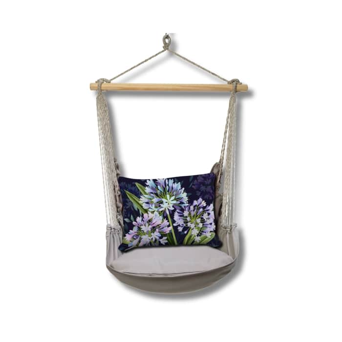 Gray outdoor swing crafted by the artisans of Magnolia Casual called the Swing Set 4 piece Gray Solid w/ Midnight Garden Lilies featuring 100 percent weather resistant fabric, weather resistant polyester fabric, handcrafted shown against a clean backdrop featuring shades of gray.