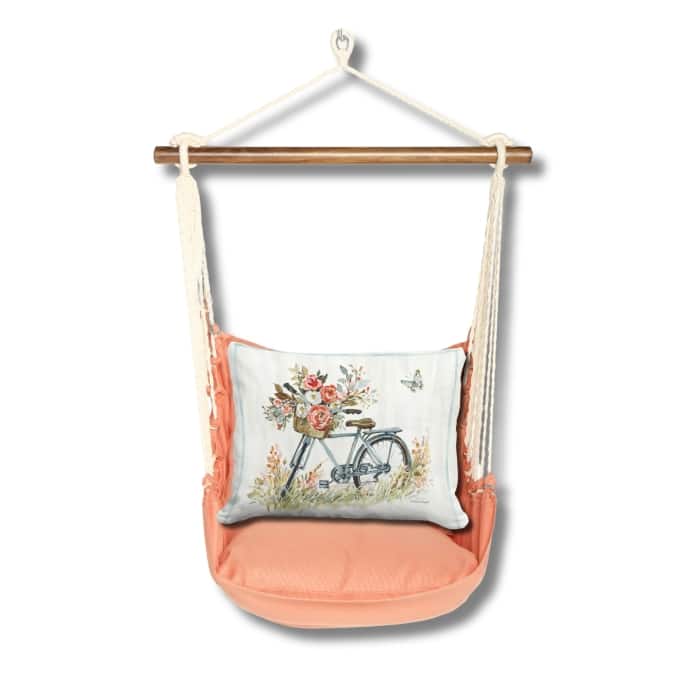 Multi colored outdoor swing crafted by the artisans of Magnolia Casual called the Swing Set 4 piece Living Coral w/ Bike with Flower Basket featuring 100 percent weather resistant fabric, weather resistant polyester fabric, handcrafted shown against a clean backdrop featuring with a coral motif and shades of coral.