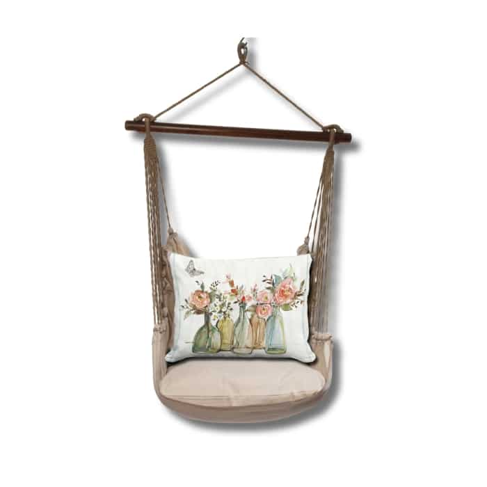 Multi colored outdoor swing crafted by the artisans of Magnolia Casual called the Swing Set 4 piece Latte Solid w/ Flowers in Glass Bottles featuring 100 percent weather resistant fabric, weather resistant polyester fabric, handcrafted shown against a clean backdrop.