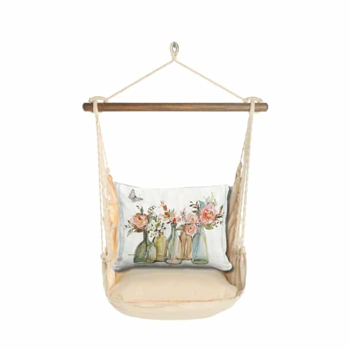 Multi colored outdoor swing crafted by the artisans of Magnolia Casual called the Swing Set 4 piece Magnolia Stripe w/ Flowers in Glass Bottles featuring 100 percent weather resistant fabric, weather resistant polyester fabric, handcrafted shown against a clean backdrop featuring with a magnolia motif.