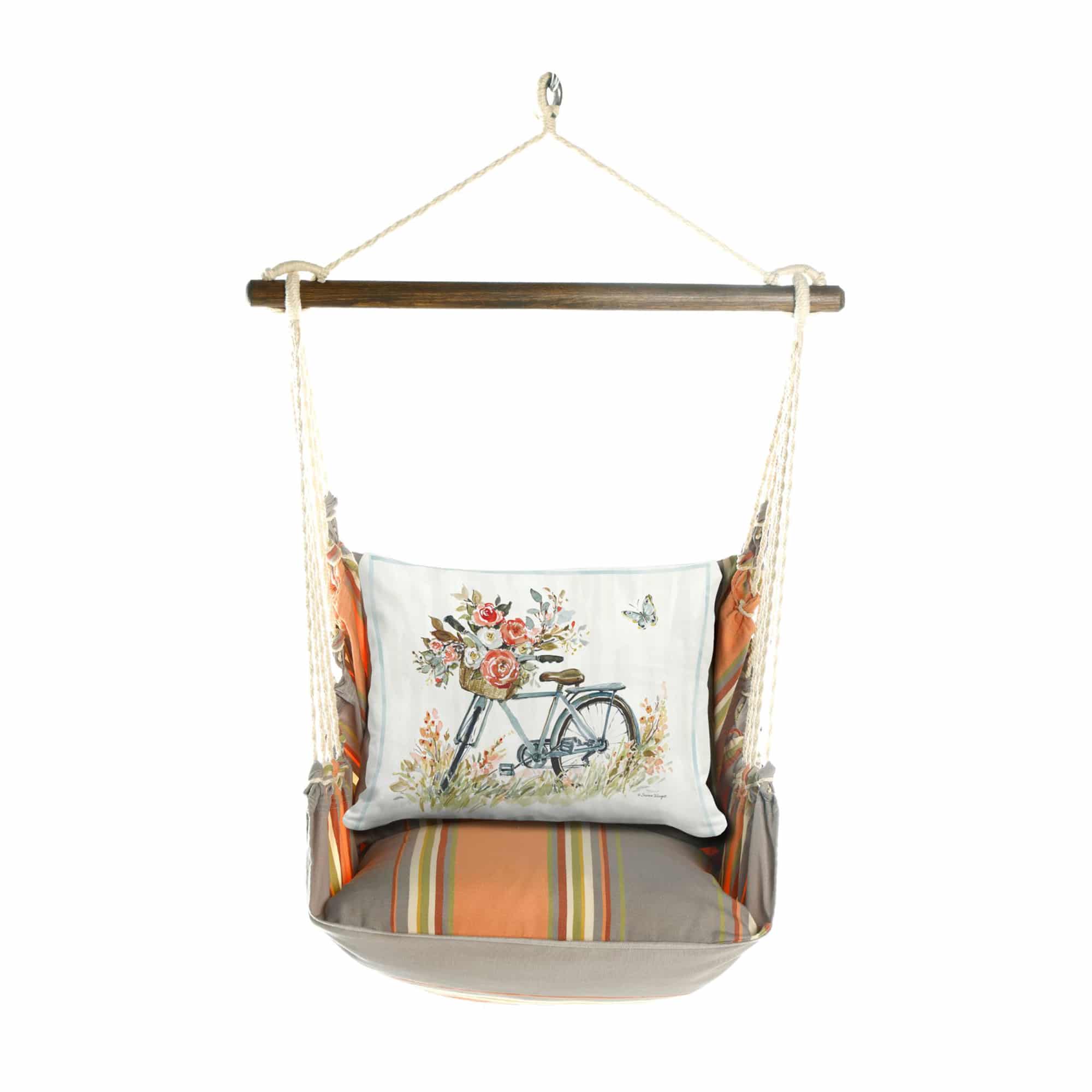 Multi colored outdoor swing crafted by the artisans of Magnolia Casual called the Swing Set 4 piece Serene Sunset w/ Bike with Flower Basket featuring 100 percent weather resistant fabric, weather resistant polyester fabric, handcrafted shown against a clean backdrop featuring with a floral motif.