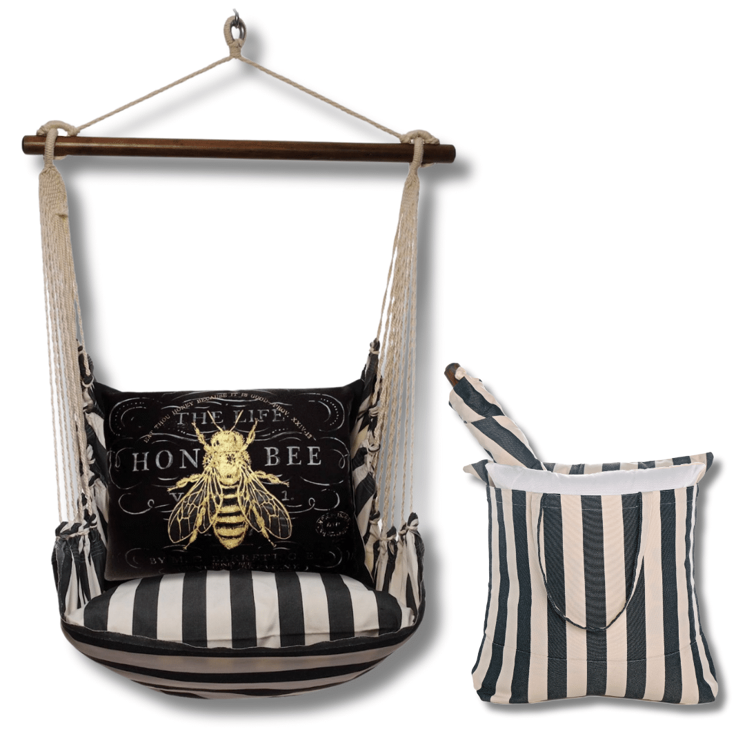 Black outdoor swing crafted by the artisans of Magnolia Casual called the Swing Set 4 piece True Black Stripe w/ Vintage Bee on Black featuring 100 percent weather resistant fabric, weather resistant polyester fabric, handcrafted shown against a clean backdrop featuring with a stripe motif and shades of black.