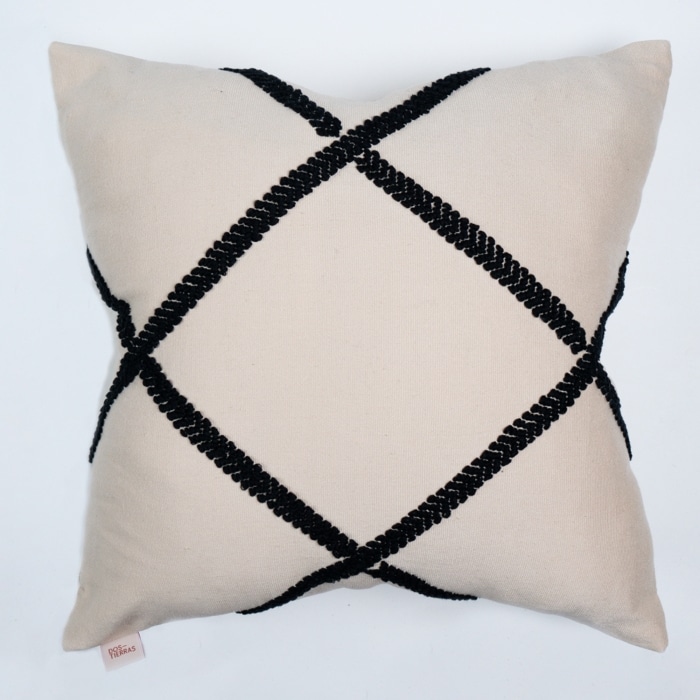 Black pillow cover crafted by the artisans of Dos Tierras called the Diamond Pillow Cover Black featuring traditional backstrap loom weave, handwoven textile, handcrafted shown against a clean backdrop featuring shades of black.