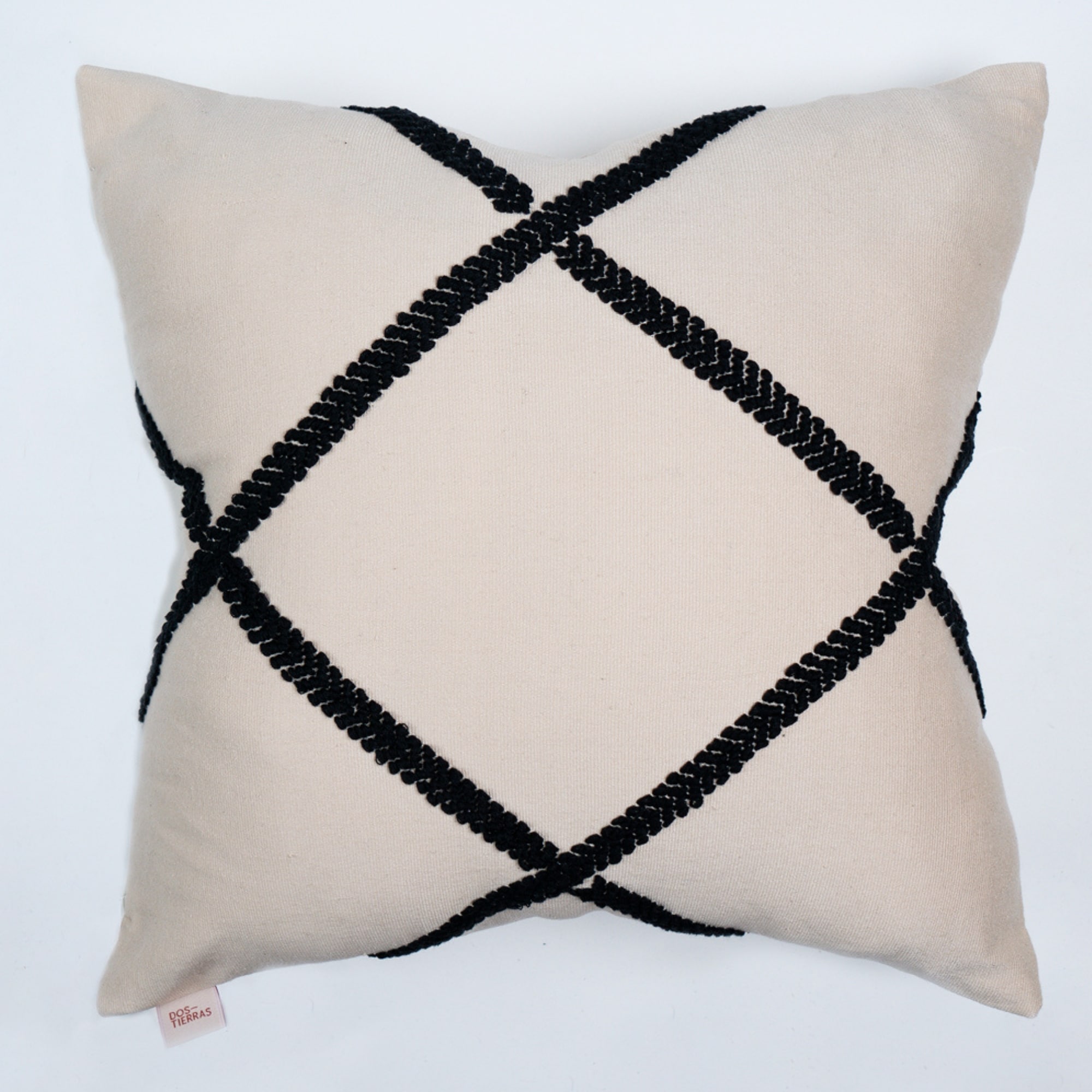 Black pillow cover crafted by the artisans of Dos Tierras called the Diamond Pillow Cover Black featuring traditional backstrap loom weave, handwoven textile, handcrafted shown against a clean backdrop featuring shades of black.