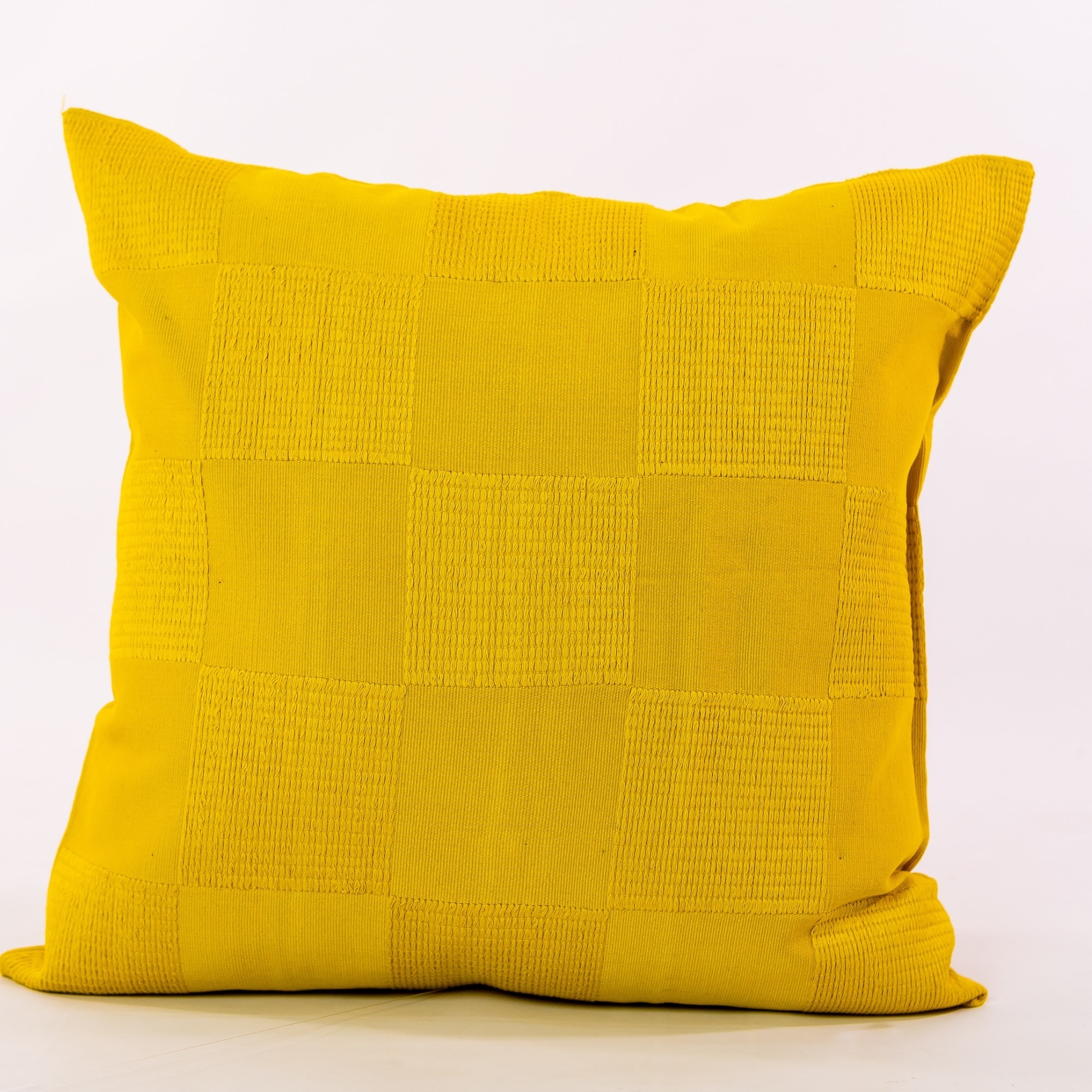 Yellow pillow cover crafted by the artisans of Dos Tierras called the Chess Pillow Cover Yellow featuring handwoven textile, handcrafted shown against a clean backdrop featuring shades of yellow.