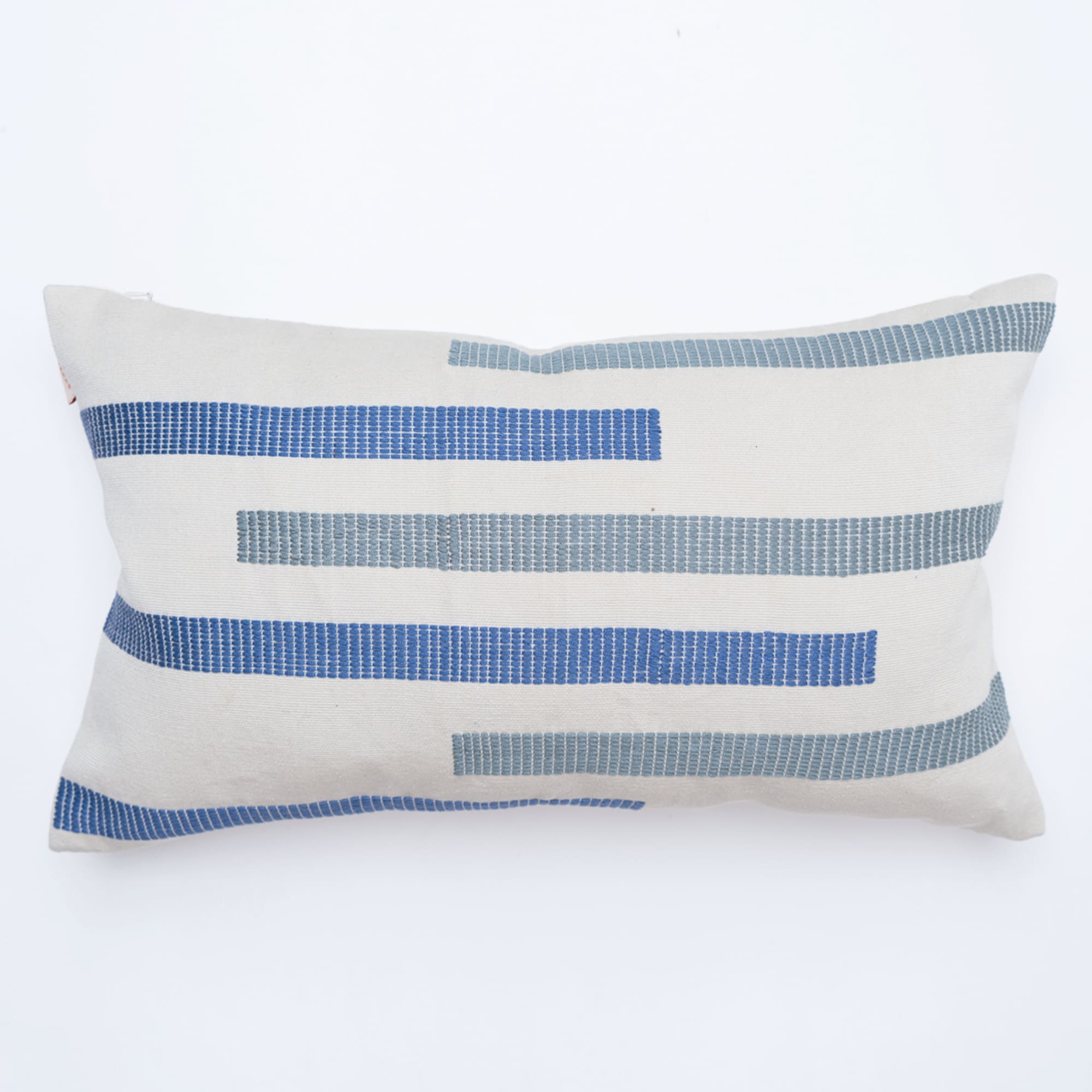 Blue pillow cover crafted by the artisans of Dos Tierras called the Telel Pillow Cover Blue featuring traditional backstrap loom weave, handwoven textile, handcrafted shown against a clean backdrop featuring shades of blue.