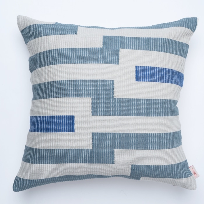 Blue pillow cover crafted by the artisans of Magnolia Casual called the Square Pillow Cover Blue featuring traditional backstrap loom weave, handwoven textile, handcrafted shown against a clean backdrop featuring shades of blue.