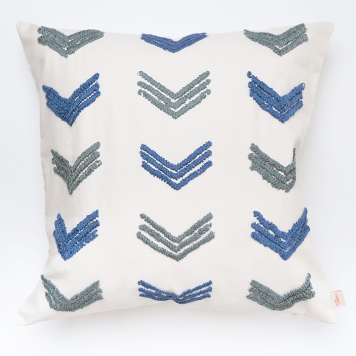 Blue pillow cover crafted by the artisans of Dos Tierras called the Tuk Pillow Cover Blue featuring quality outdoor fabric, handcrafted shown against a clean backdrop featuring shades of blue.