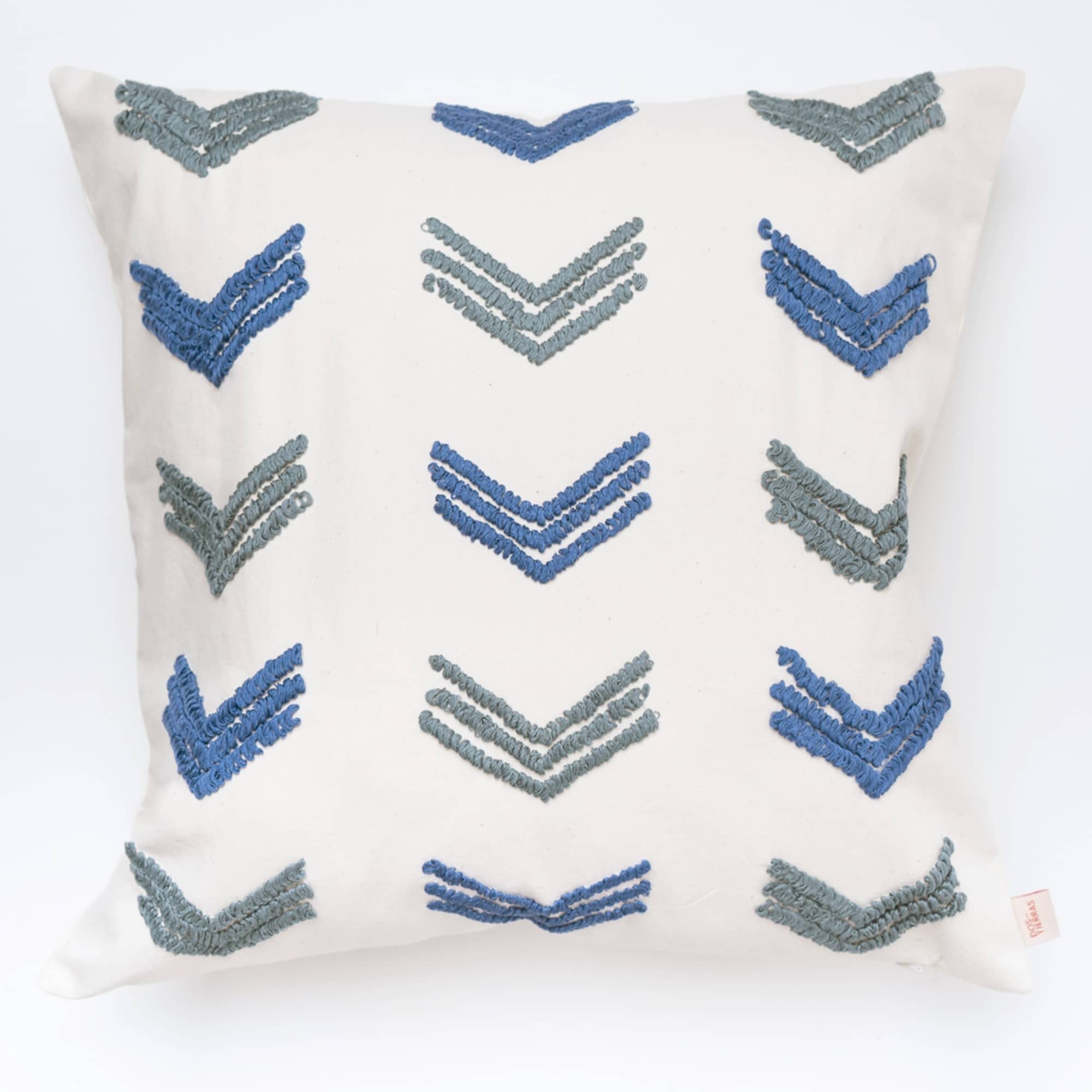 Blue pillow cover crafted by the artisans of Dos Tierras called the Tuk Pillow Cover Blue featuring quality outdoor fabric, handcrafted shown against a clean backdrop featuring shades of blue.