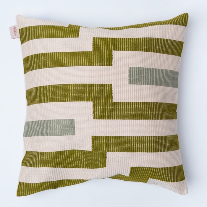 Green pillow cover crafted by the artisans of Magnolia Casual called the Square Pillow Cover Green featuring traditional backstrap loom weave, handwoven textile, handcrafted shown against a clean backdrop featuring shades of green.