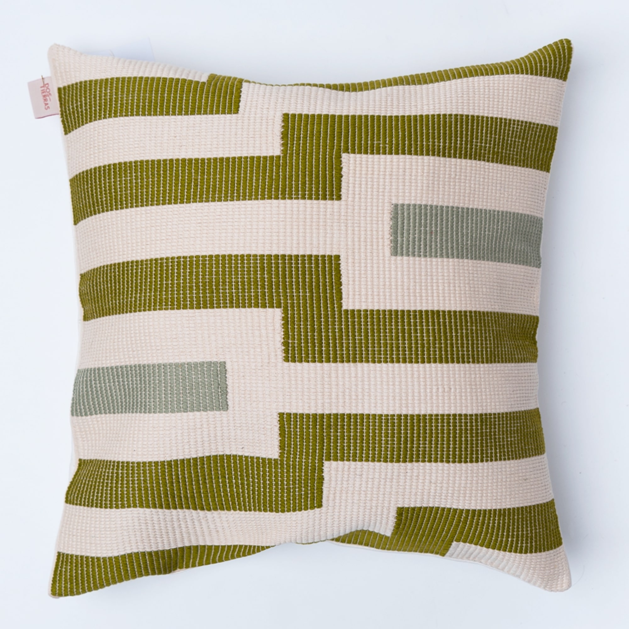 Green pillow cover crafted by the artisans of Magnolia Casual called the Square Pillow Cover Green featuring traditional backstrap loom weave, handwoven textile, handcrafted shown against a clean backdrop featuring shades of green.