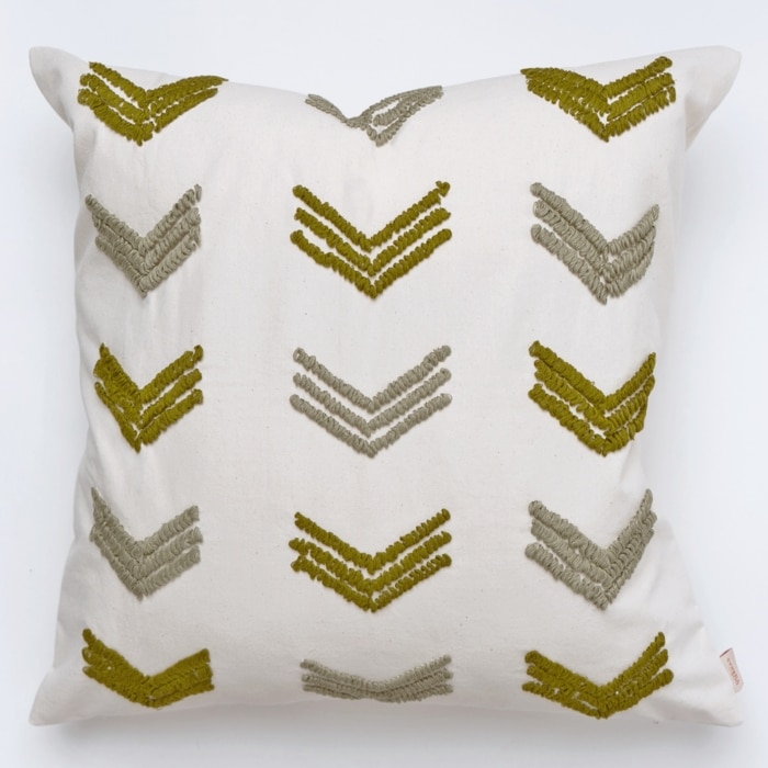 Green pillow cover crafted by the artisans of Dos Tierras called the Tuk Pillow Cover Green featuring quality outdoor fabric, handcrafted shown against a clean backdrop featuring shades of green.