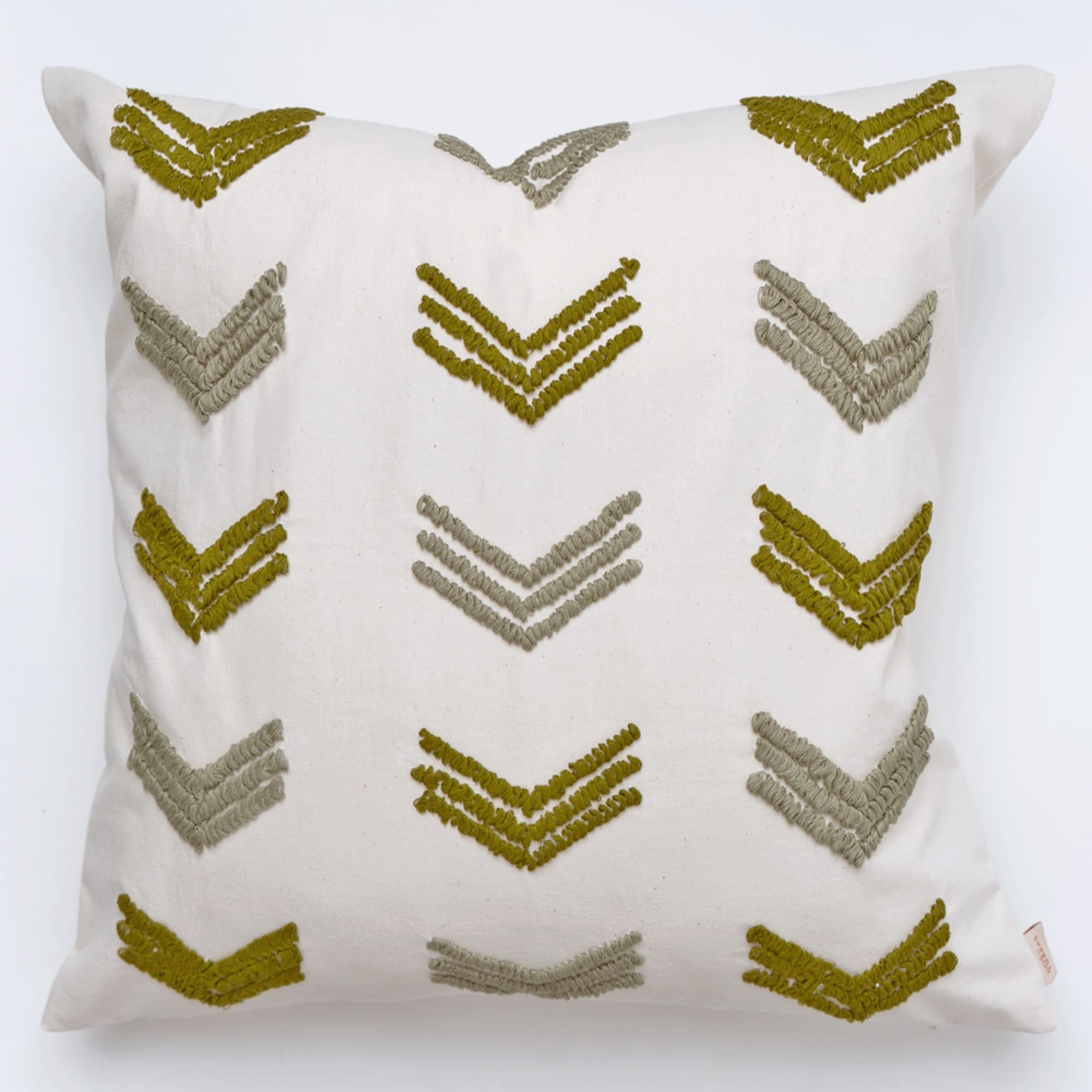 Green pillow cover crafted by the artisans of Dos Tierras called the Tuk Pillow Cover Green featuring quality outdoor fabric, handcrafted shown against a clean backdrop featuring shades of green.