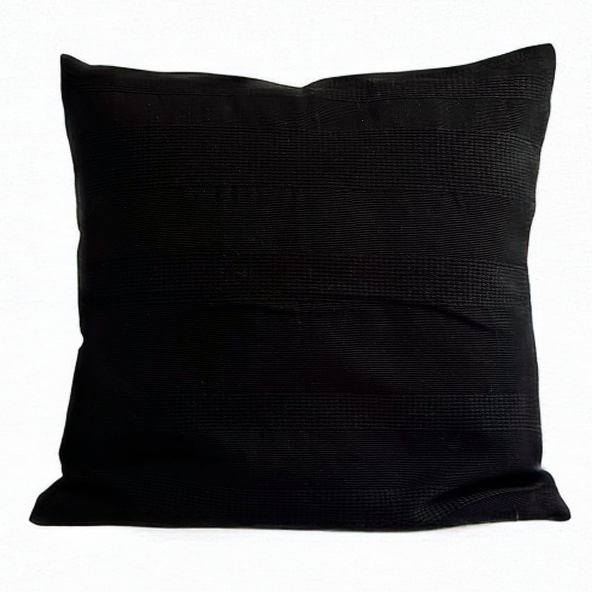 Black pillow cover crafted by the artisans of Magnolia Casual called the Lines Pillow Cover Black featuring handwoven textile, handcrafted shown against a clean backdrop featuring shades of black.