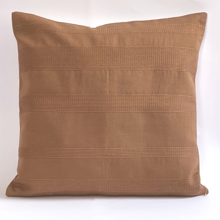 Tan pillow cover crafted by the artisans of Magnolia Casual called the Lines Pillow Cover Tan featuring handwoven textile, handcrafted shown against a clean backdrop.