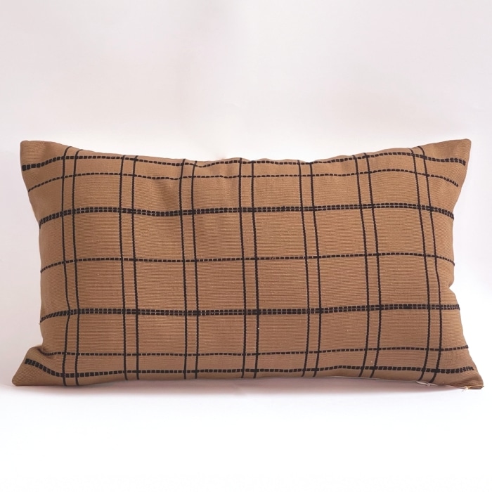 Tan pillow cover crafted by the artisans of Dos Tierras called the Grid Lumbar Pillow Cover Tan featuring handwoven textile, handcrafted shown against a clean backdrop featuring with a grid motif.
