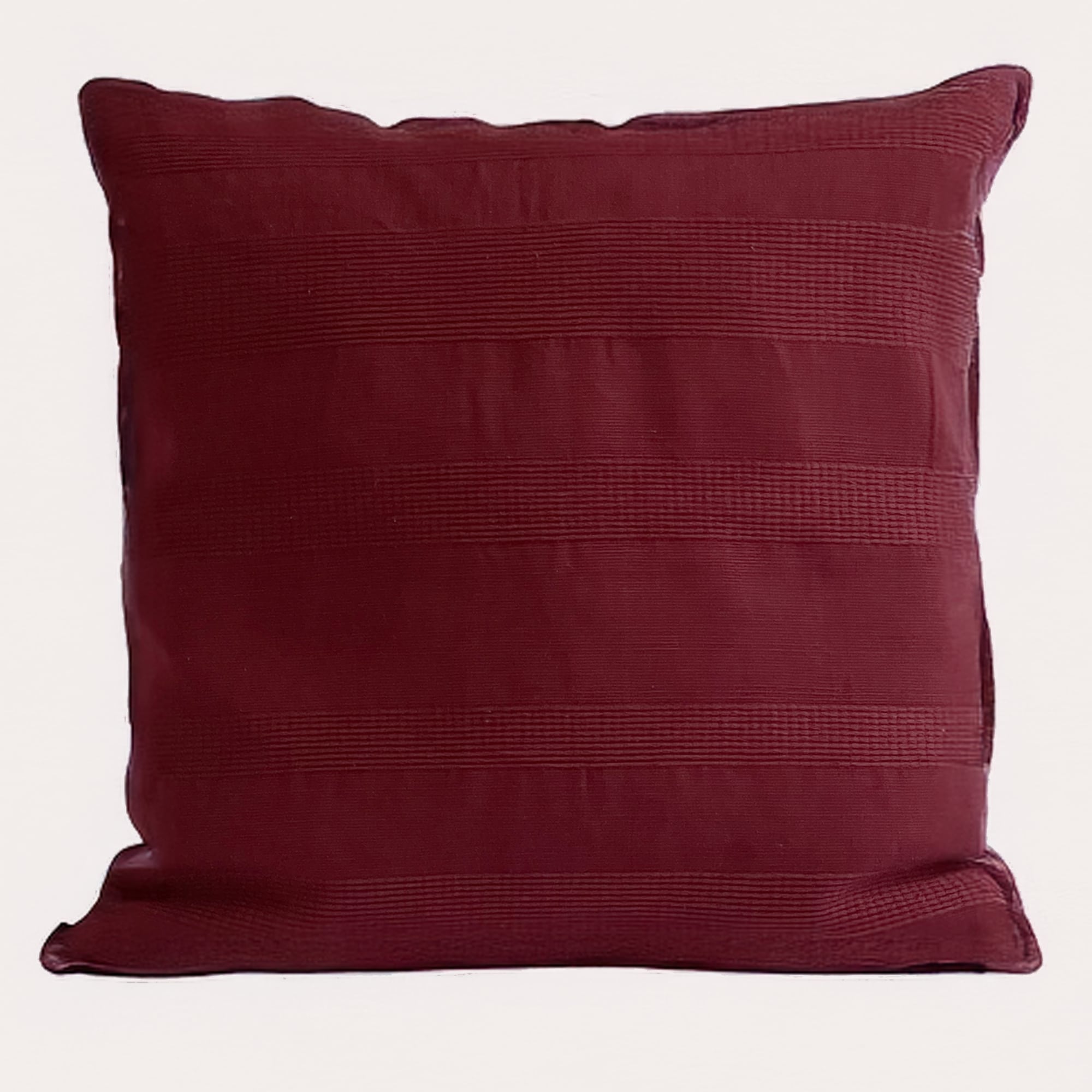 Burgundy pillow cover crafted by the artisans of Magnolia Casual called the Lines Pillow Cover Burgundy featuring handwoven textile, handcrafted shown against a clean backdrop featuring shades of burgundy.