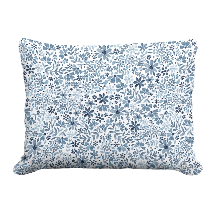 Multi colored outdoor pillow crafted by the artisans of Magnolia Casual called the Outdoor Pillow Indigo Flourish 19x24 featuring quality outdoor fabric shown against a clean backdrop.