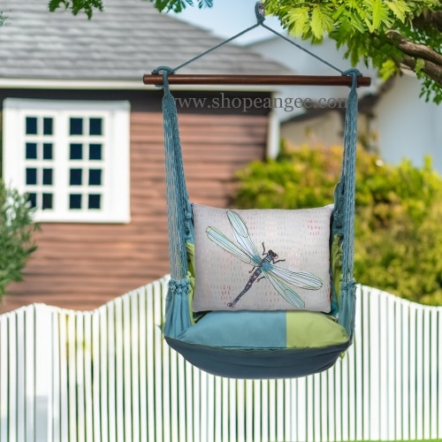 In a coastal inspired deck chair a blue outdoor swing crafted by the artisans of Magnolia Casual called the Swing Set 4 piece Meadow Mist Stripe w/ Dragonfly Blue is displayed featuring 100 percent weather resistant fabric, weather resistant polyester fabric, handcrafted, natural materials adding comfort and style to the space featuring with a stripe motif and shades of blue.