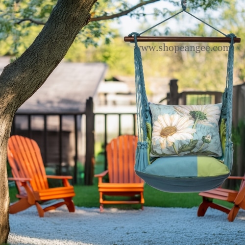 In a poolside chaise a white outdoor swing crafted by the artisans of Magnolia Casual called the Swing Set 4 piece Meadow Mist Stripe w/ White Daisies is displayed featuring 100 percent weather resistant fabric, weather resistant polyester fabric, handcrafted, natural materials adding comfort and style to the space featuring with a stripe motif and shades of white.
