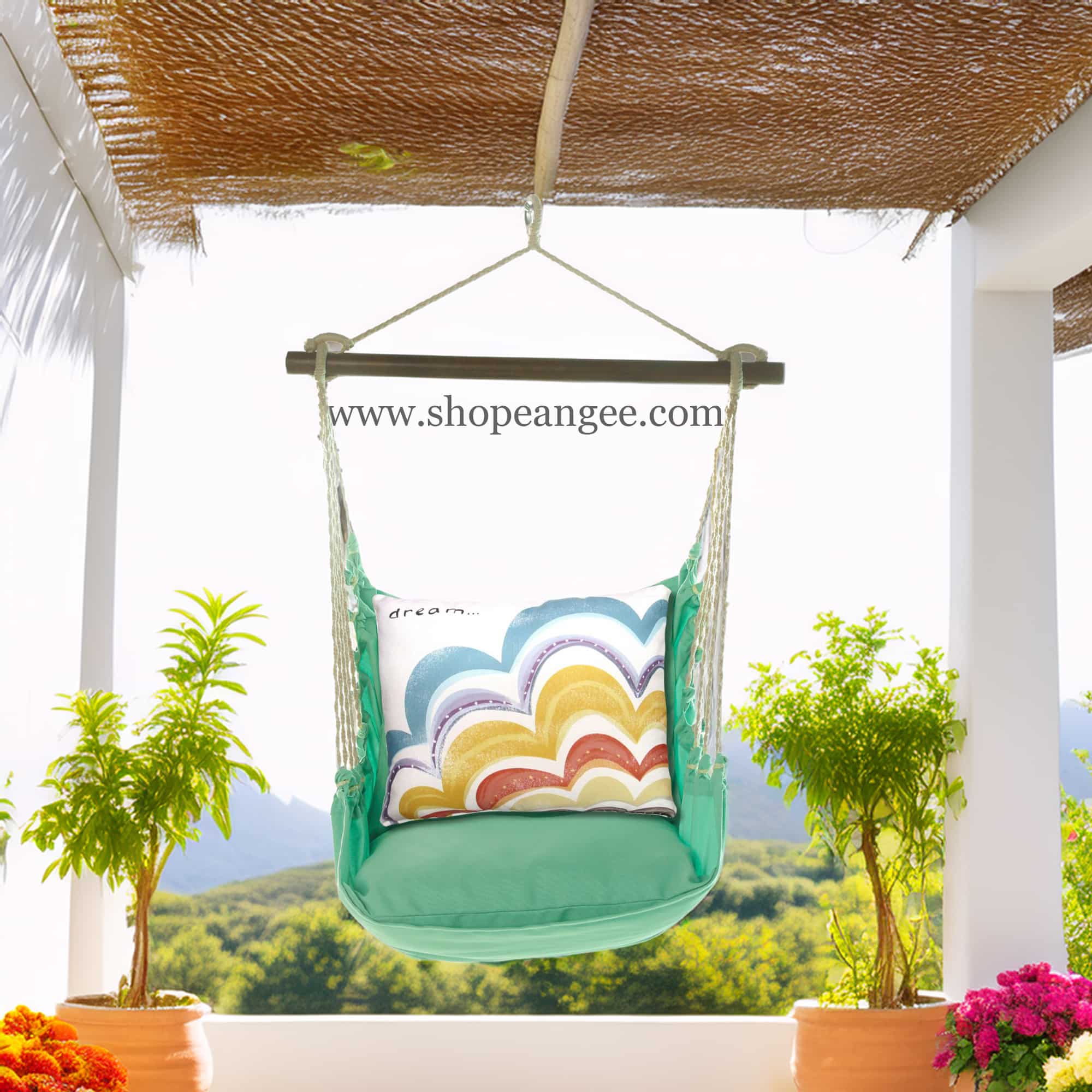 In a sunlit patio lounge a green outdoor swing crafted by the artisans of Magnolia Casual called the Swing Set 4 piece Seafoam Green Solid w/ Dream is displayed featuring 100 percent weather resistant fabric, weather resistant polyester fabric, handcrafted adding comfort and style to the space featuring shades of green.
