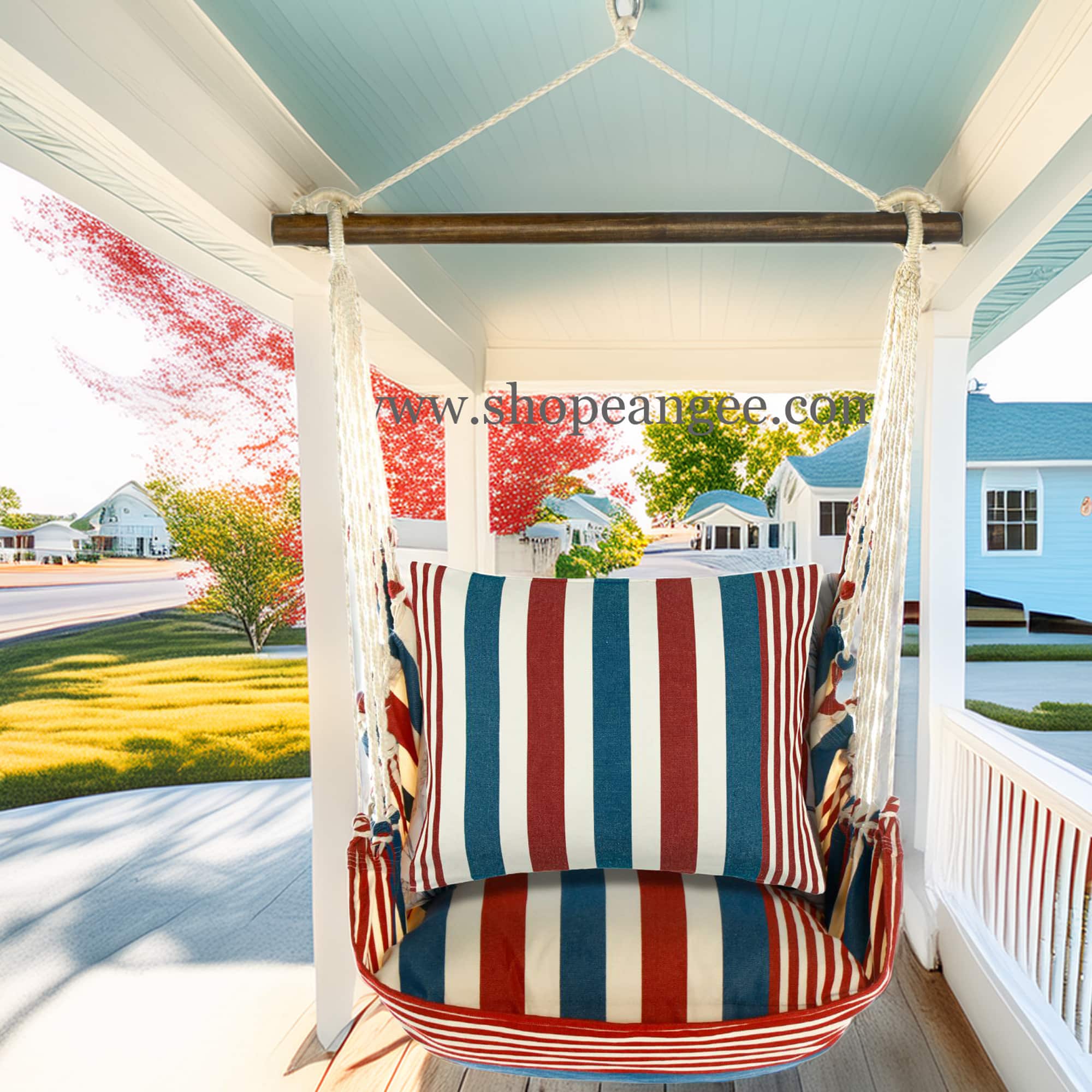 In a poolside chaise a multi colored outdoor swing crafted by the artisans of Magnolia Casual called the Swing Set 4 piece Stars & Stripes w/ Star & Stripe is displayed featuring 100 percent weather resistant fabric, weather resistant polyester fabric, handcrafted adding comfort and style to the space featuring with a stripes motif.