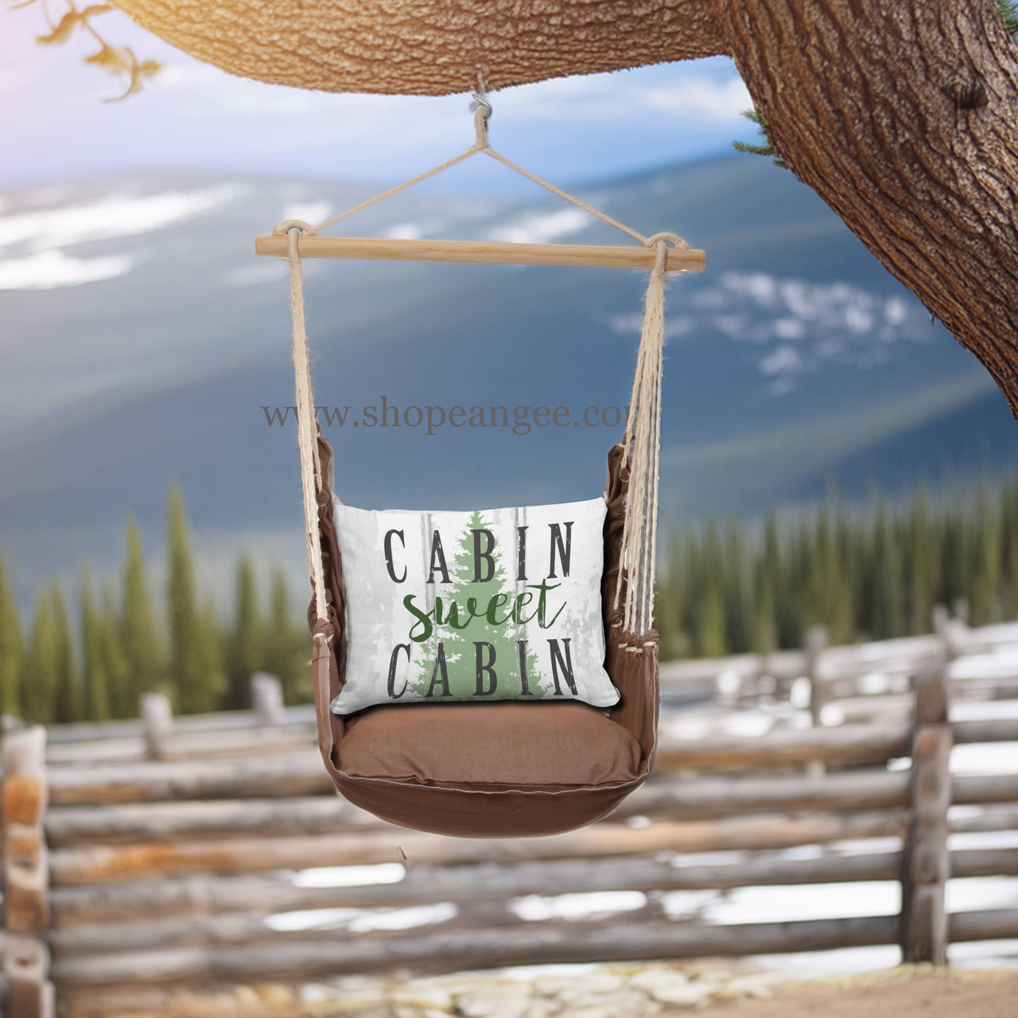 In a sunlit patio lounge a multi colored outdoor swing crafted by the artisans of Magnolia Casual called the Swing Set 4 piece Chocolate Solid w/ Cabin Sweet Cabin is displayed featuring 100 percent weather resistant fabric, weather resistant polyester fabric, artisan, natural materials adding comfort and style to the space.
