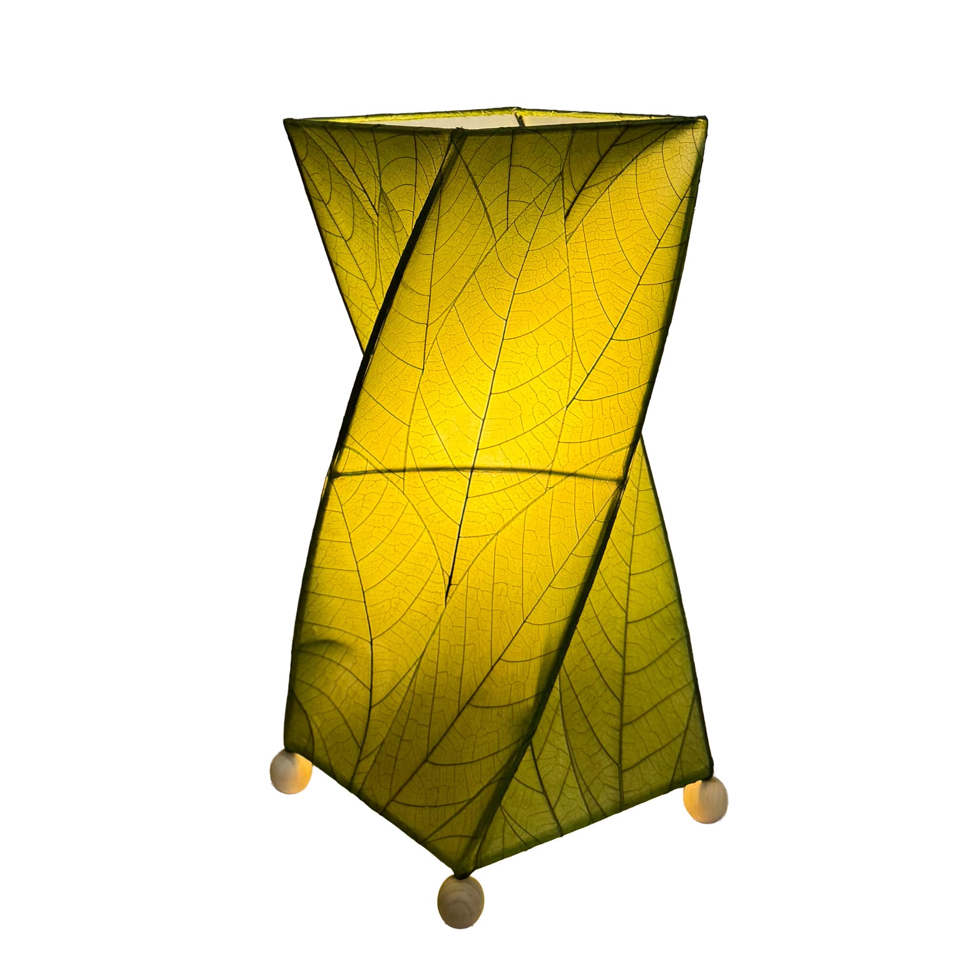 Crafted by the artisans of Eangee Home Design, the Twist Table Lamp in green against a clean backdrop, featuring fossilized cocoa leaf shade, wrought iron frame, handcrafted.