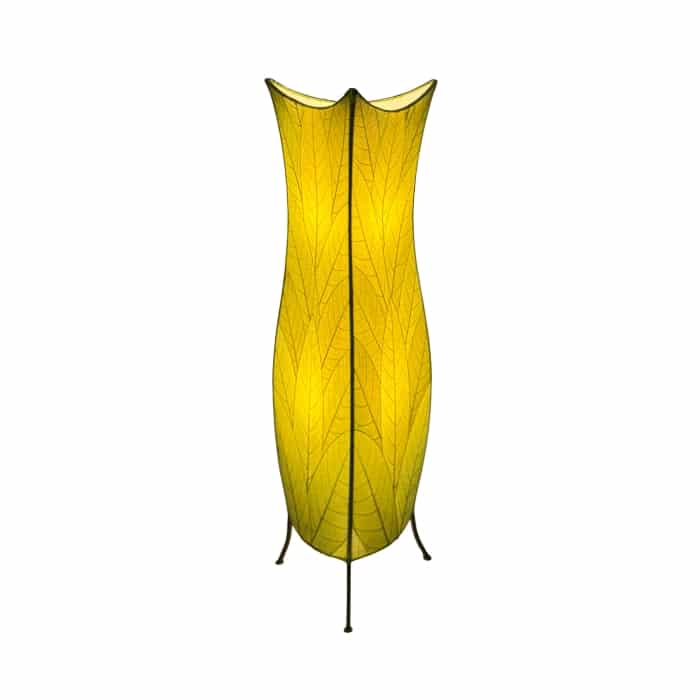 In a coastal inspired living room, crafted by the artisans of Eangee Home Design, the Flowerbud Large Floor Lamp in green stands gracefully, featuring fossilized cocoa leaf shade, adding warmth and character to the space.