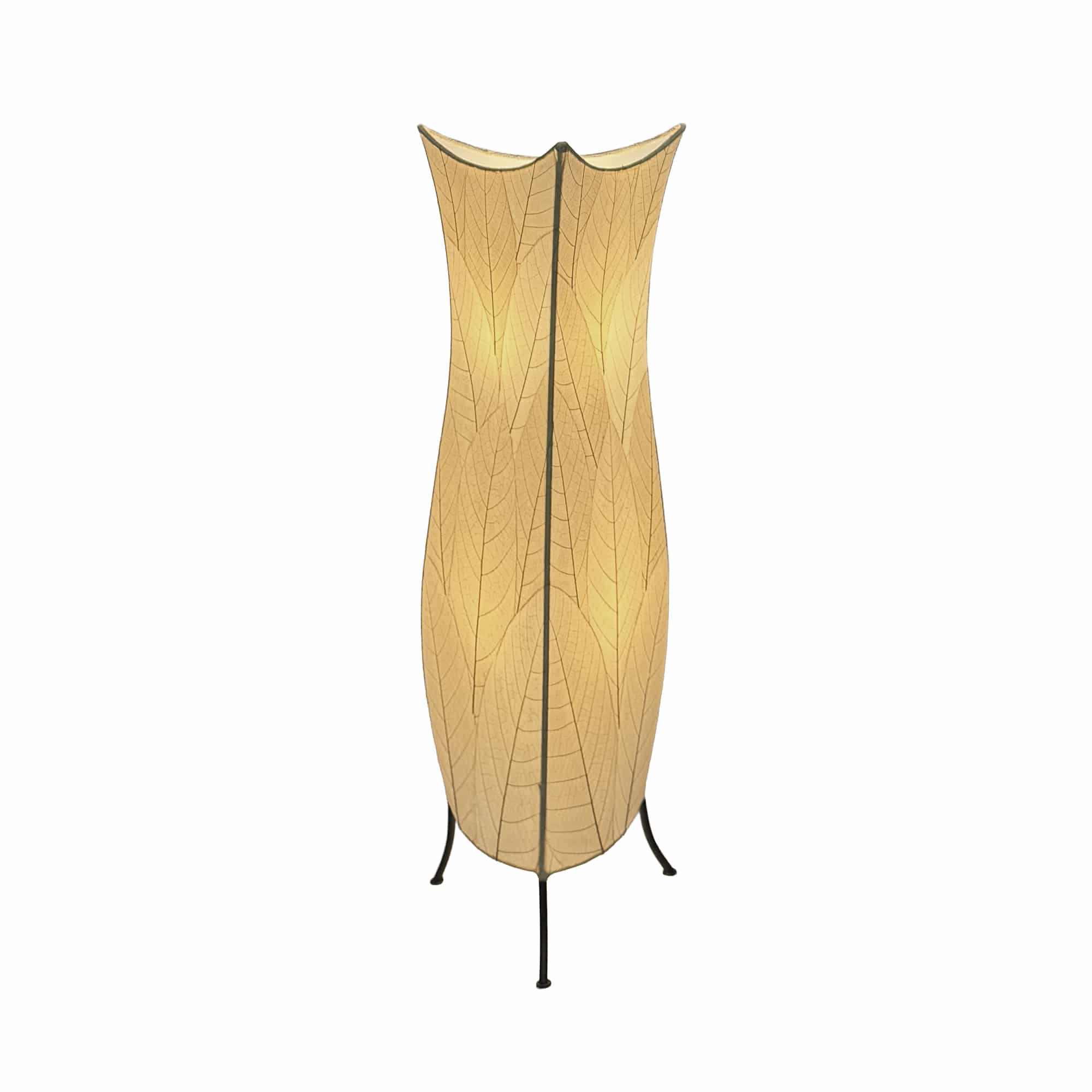 In a quiet bedside corner, crafted by the artisans of Eangee Home Design, the Flowerbud Large Floor Lamp in natural stands gracefully, featuring fossilized cocoa leaf shade, adding warmth and character to the space.