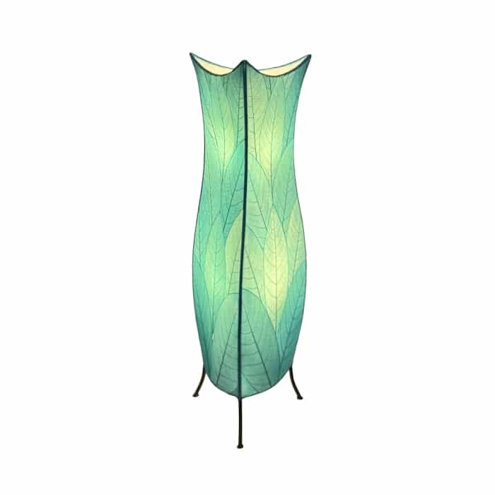 In a modern interior with earth tones, crafted by the artisans of Eangee Home Design, the Flowerbud Large Floor Lamp in sea blue stands gracefully, featuring fossilized cocoa leaf shade, adding warmth and character to the space.
