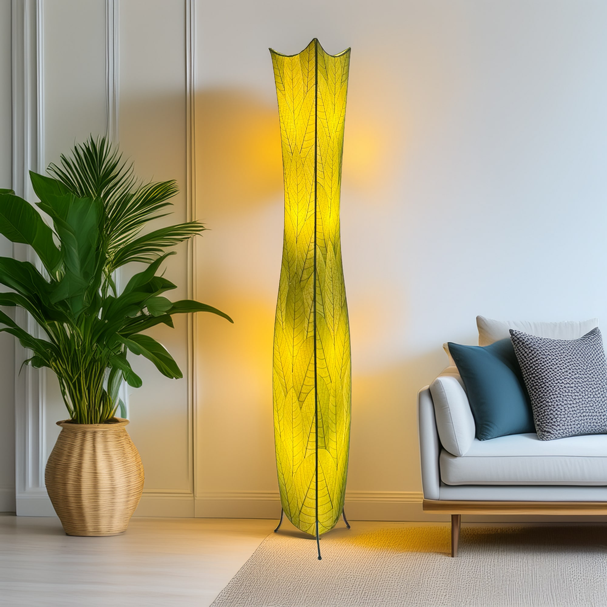Crafted by the artisans of Eangee Home Design, the Flowerbud Giant Floor Lamp in green against a clean backdrop, featuring fossilized cocoa leaf shade.