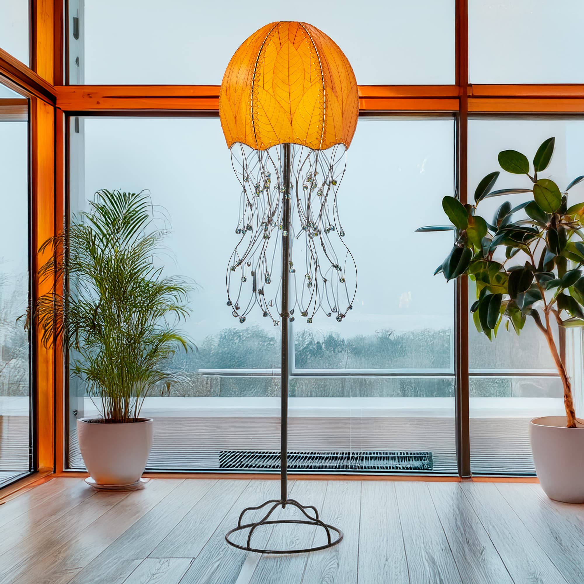 Orange Jellyfish Large Floor Lamp by Eangee Home Design - dome shade formed from fossilized cocoa leaves with iron tendril 'tentacles' dotted by glass beads; softly illuminates while bringing coastal whimsy.