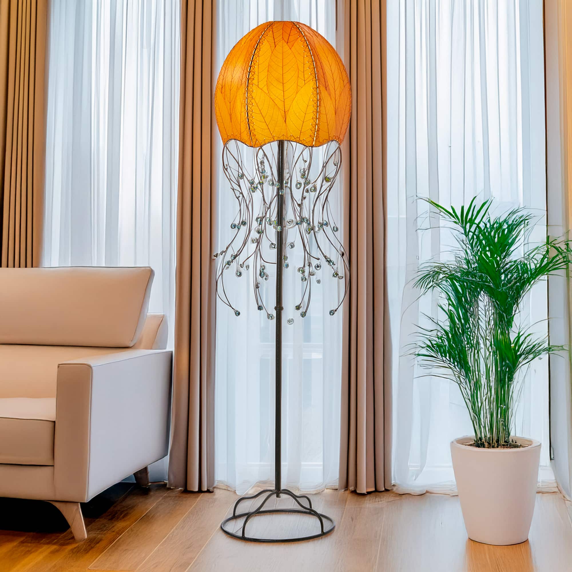 Orange Jellyfish Large Floor Lamp by Eangee Home Design - dome shade formed from fossilized cocoa leaves with iron tendril 'tentacles' dotted by glass beads; radiates a calming ambient light while lending artful biophilic texture.