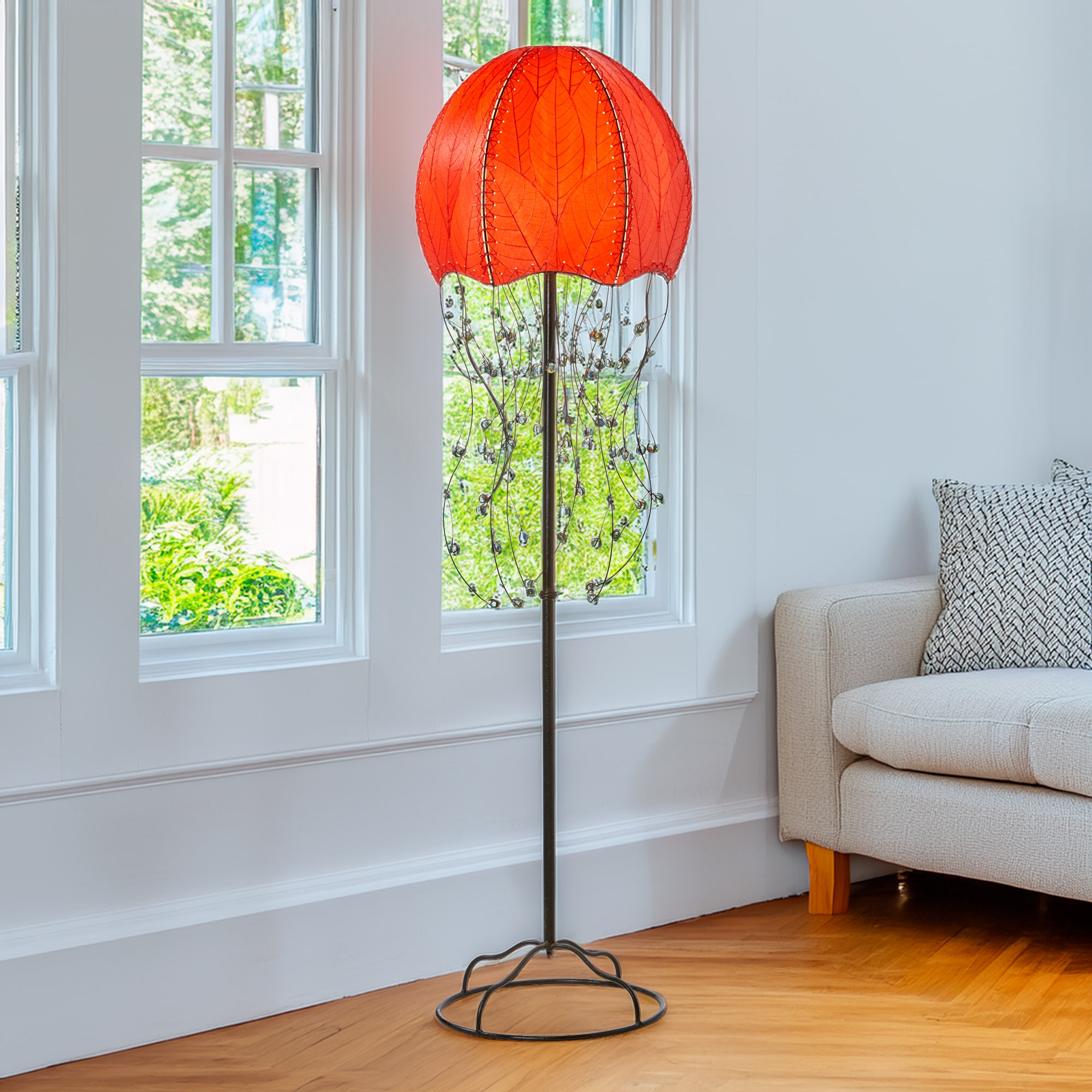 Red Jellyfish Large Floor Lamp by Eangee Home Design - dome shade formed from fossilized cocoa leaves with iron tendril 'tentacles' dotted by glass beads; casts a warm organic glow while evoking the movement of a drifting jellyfish.