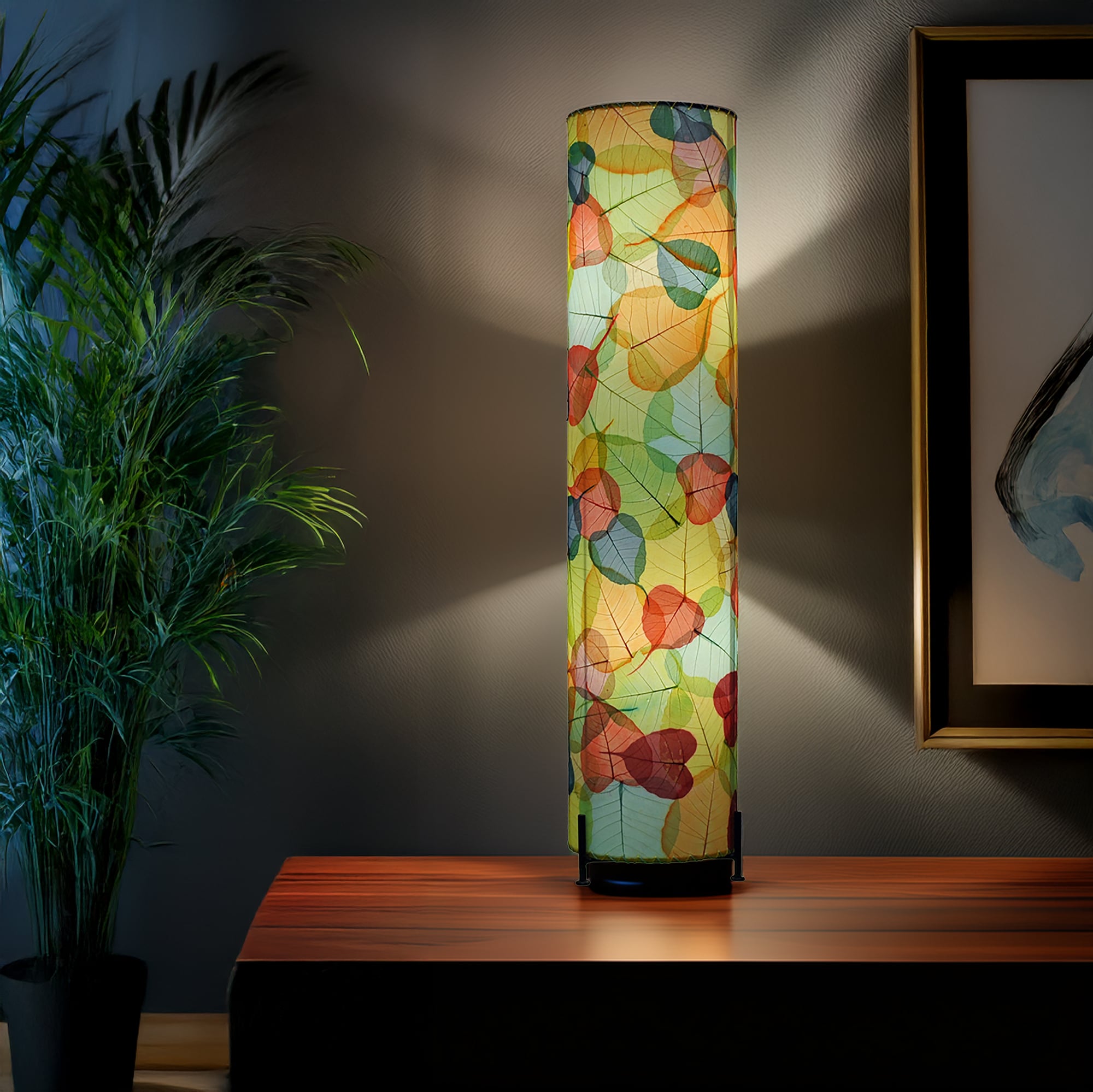 Multicolor Banyan Large Floor Lamp by Eangee Home Design - cylindrical floor lamp featuring layered fossilized cocoa leaves on a wrought-iron frame; hand-built design glows with cheerful leaf patterns, shaping daylight-filled interiors.
