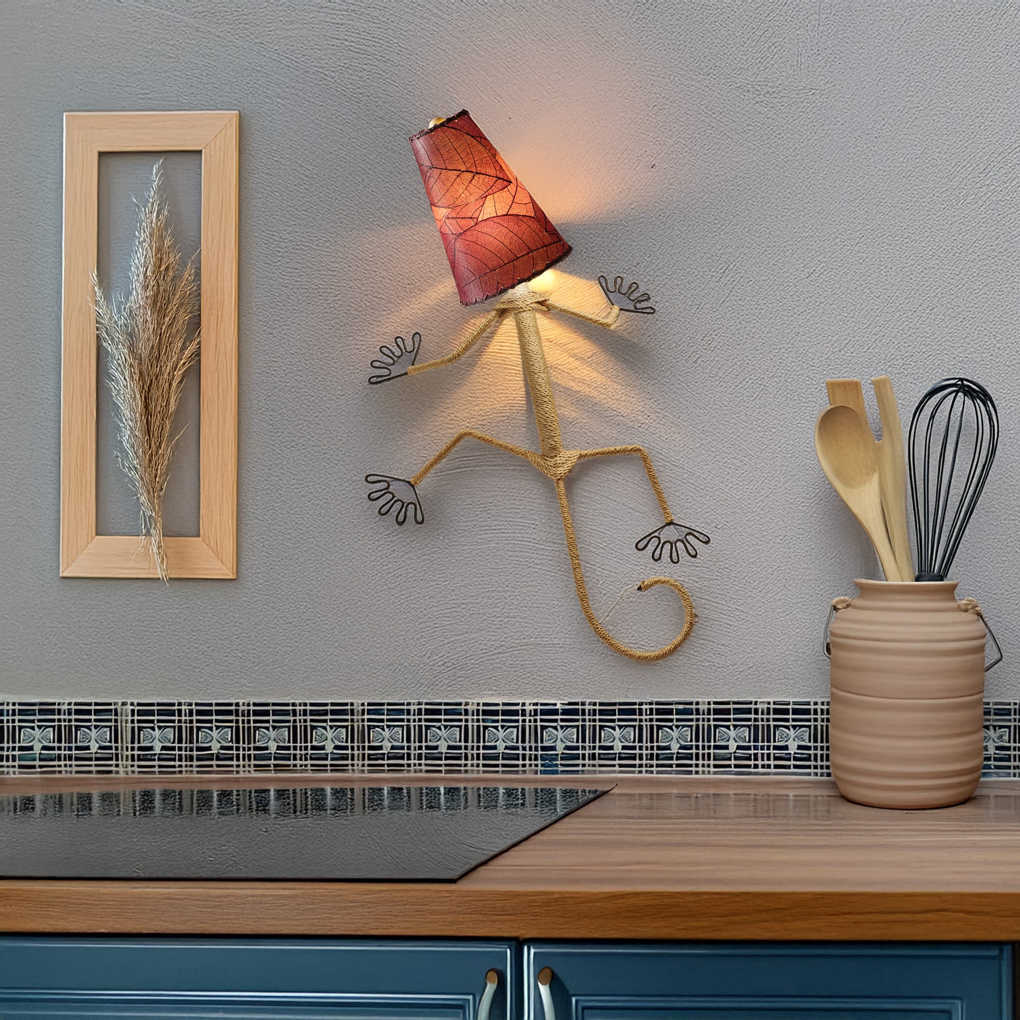 Eangee Home Design Gecko Wall Sconce in plum with a shade made of real cocoa leaves, fun gecko light accentuating a stylish kitchen backsplash